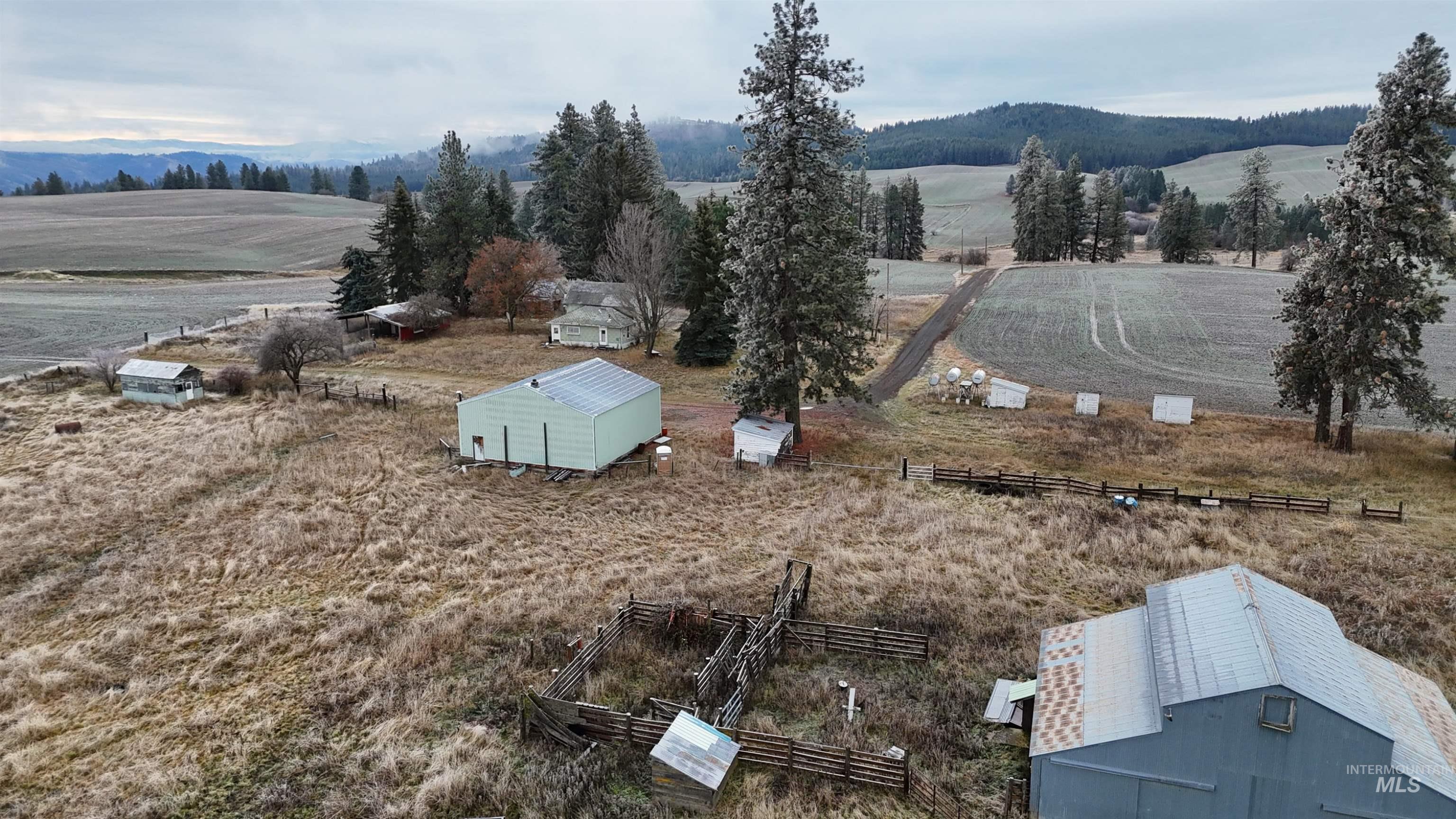 Overview of rural landscape featuring a mountain backdrop