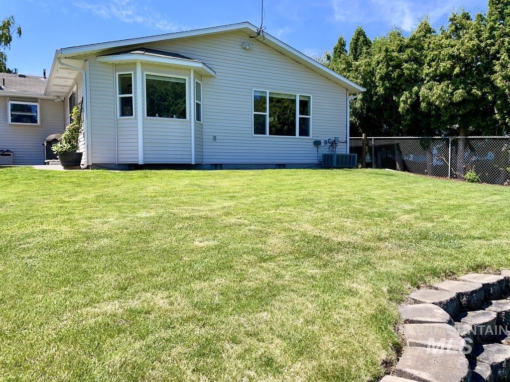 Back of house featuring crawl space