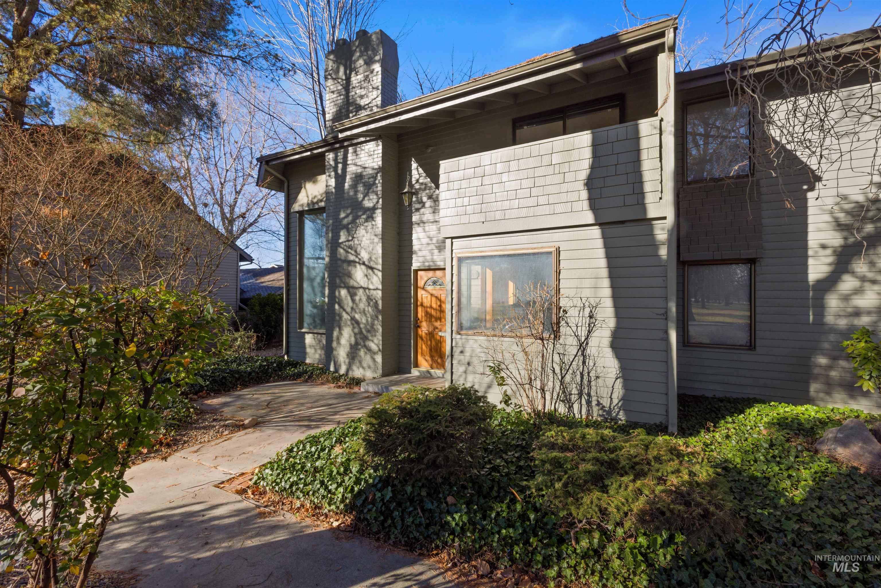 View of home's exterior with a chimney
