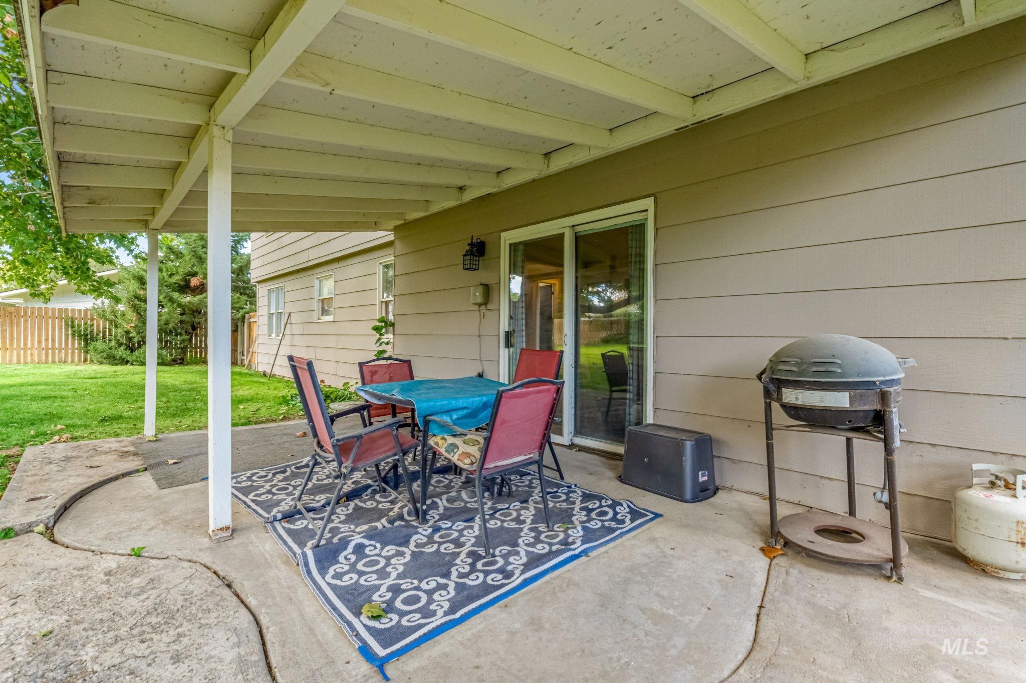 View of patio / terrace featuring grilling area and outdoor dining space