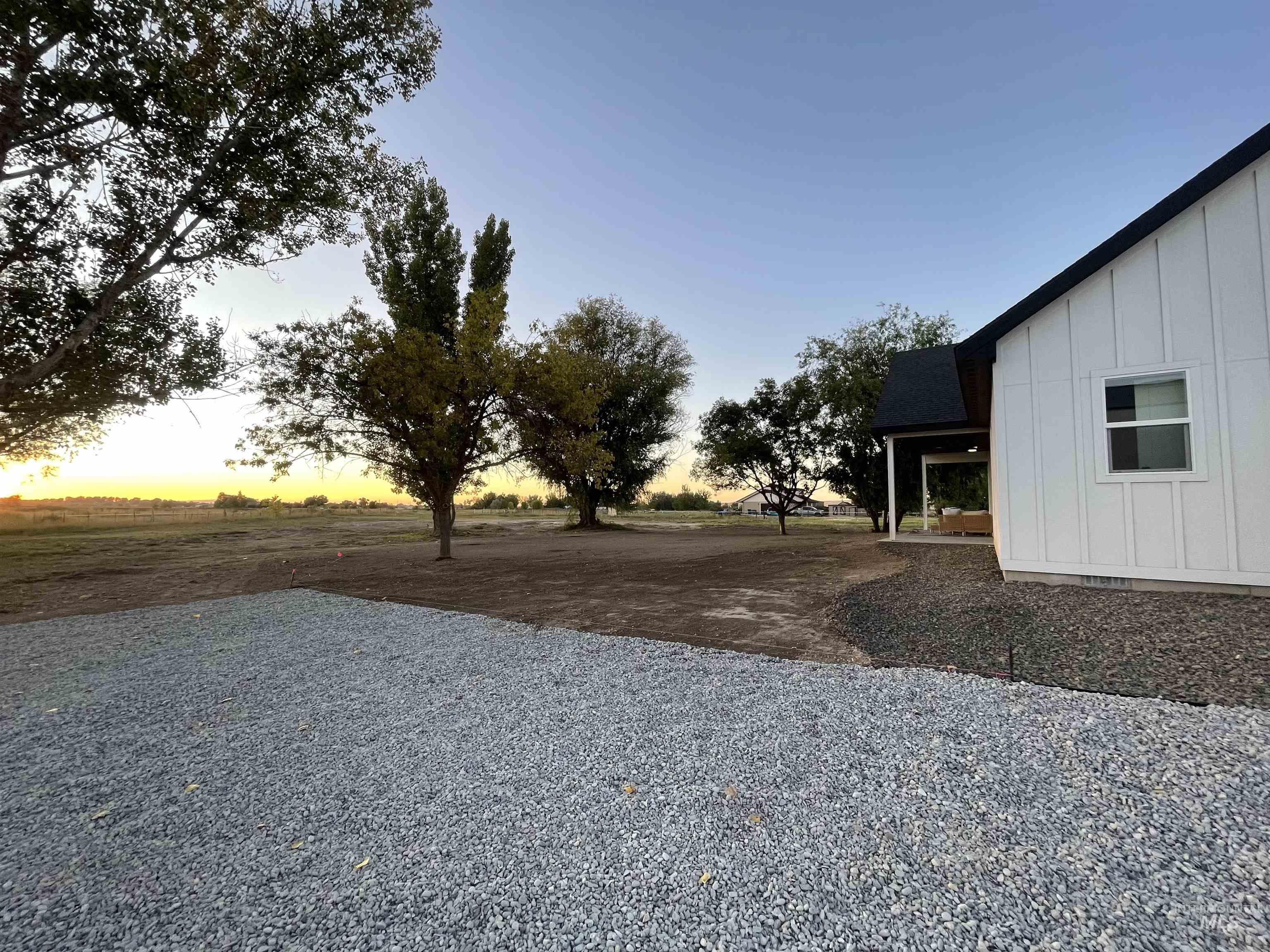 View of yard at dusk