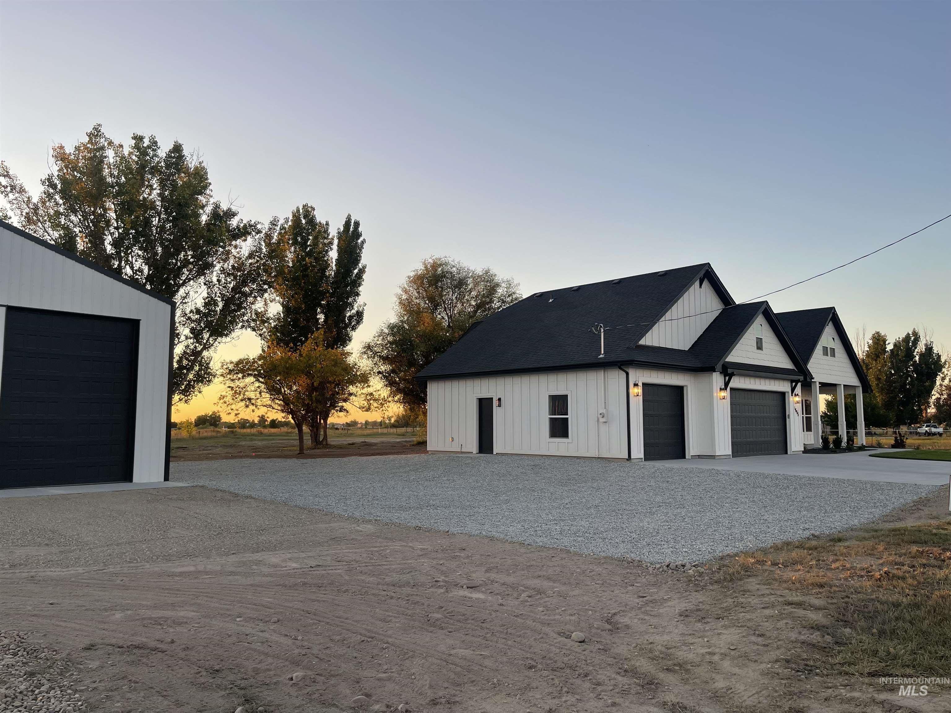 Garage featuring driveway