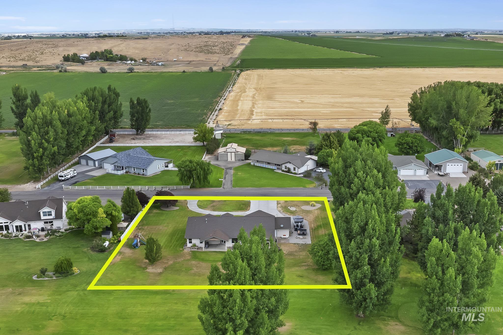 Overview of rural landscape with property parcel outlined
