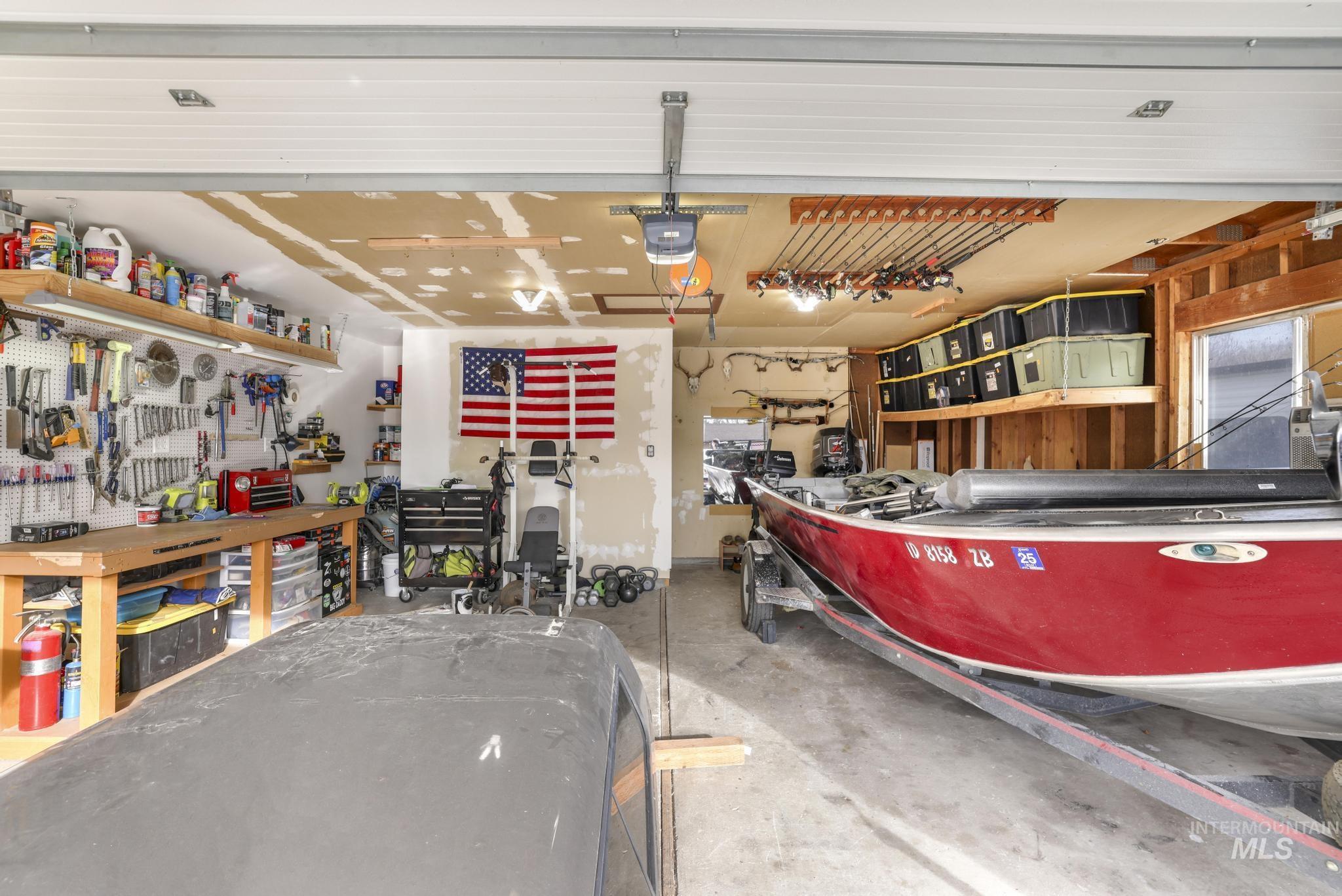 Garage featuring a workshop area