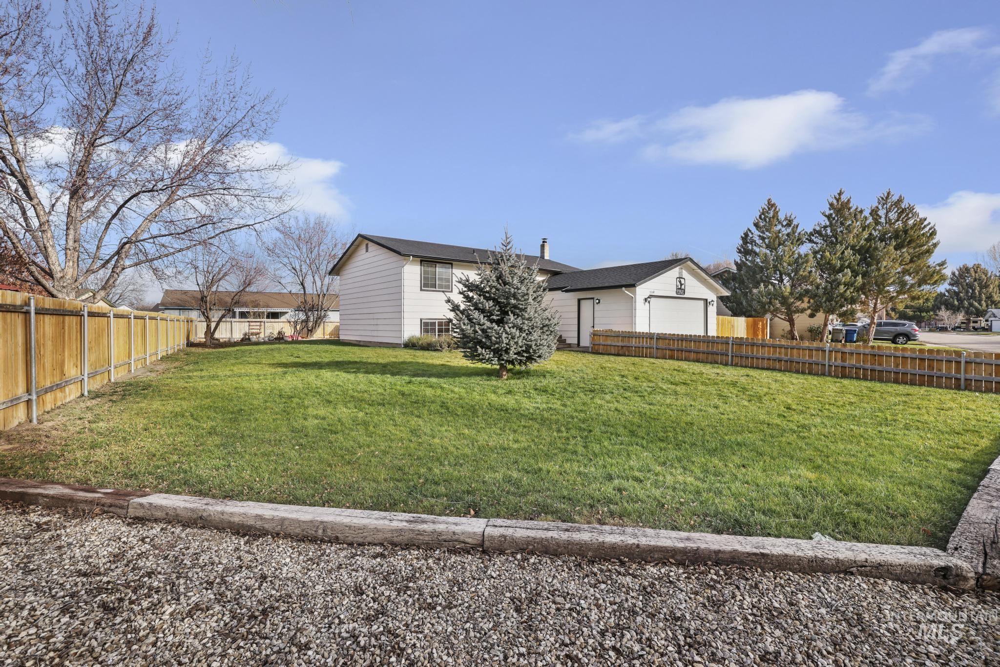 View of fenced backyard