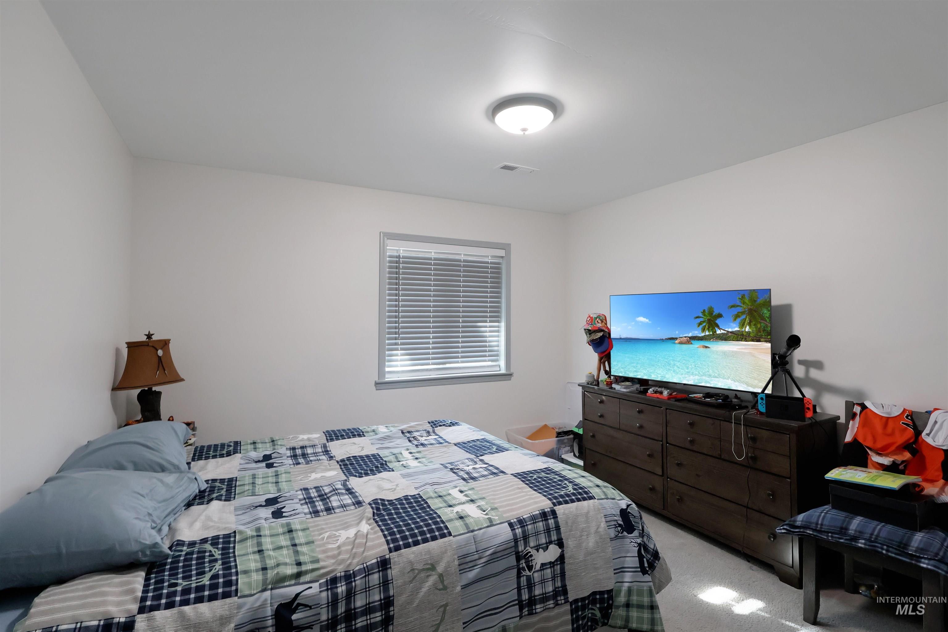 Bedroom featuring carpet