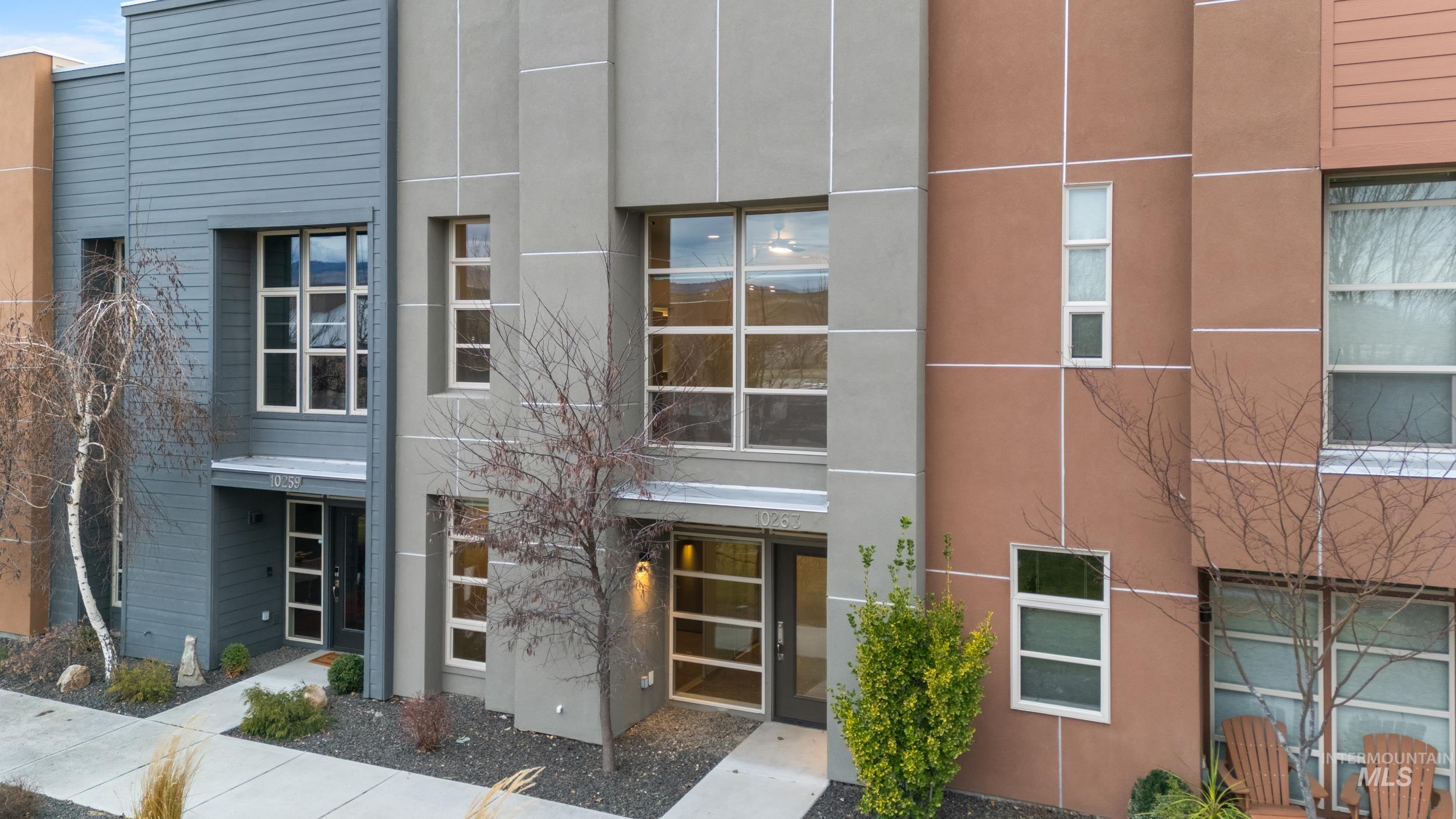 View of front of house with stucco siding