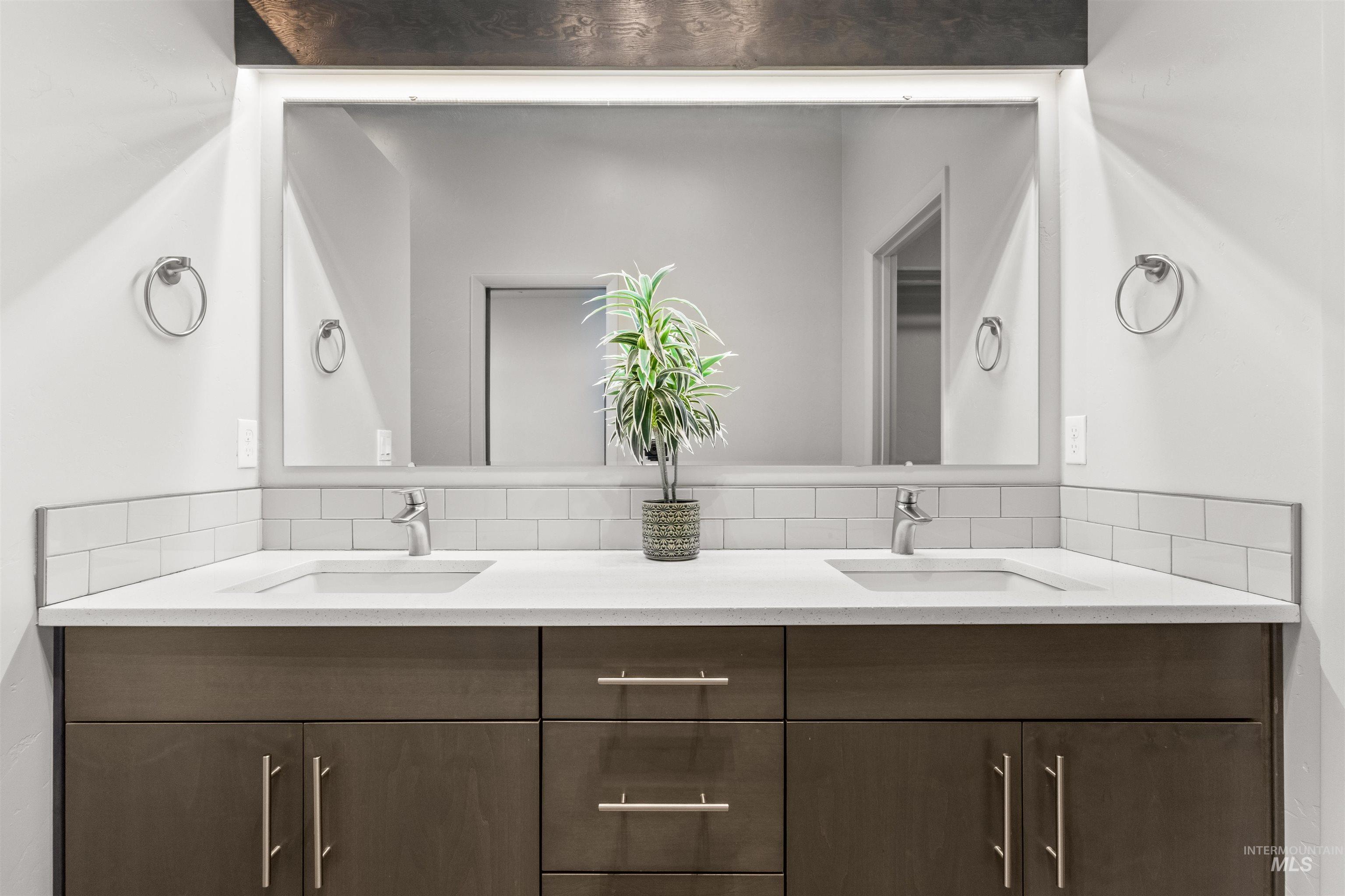 Master Bathroom featuring double vanity