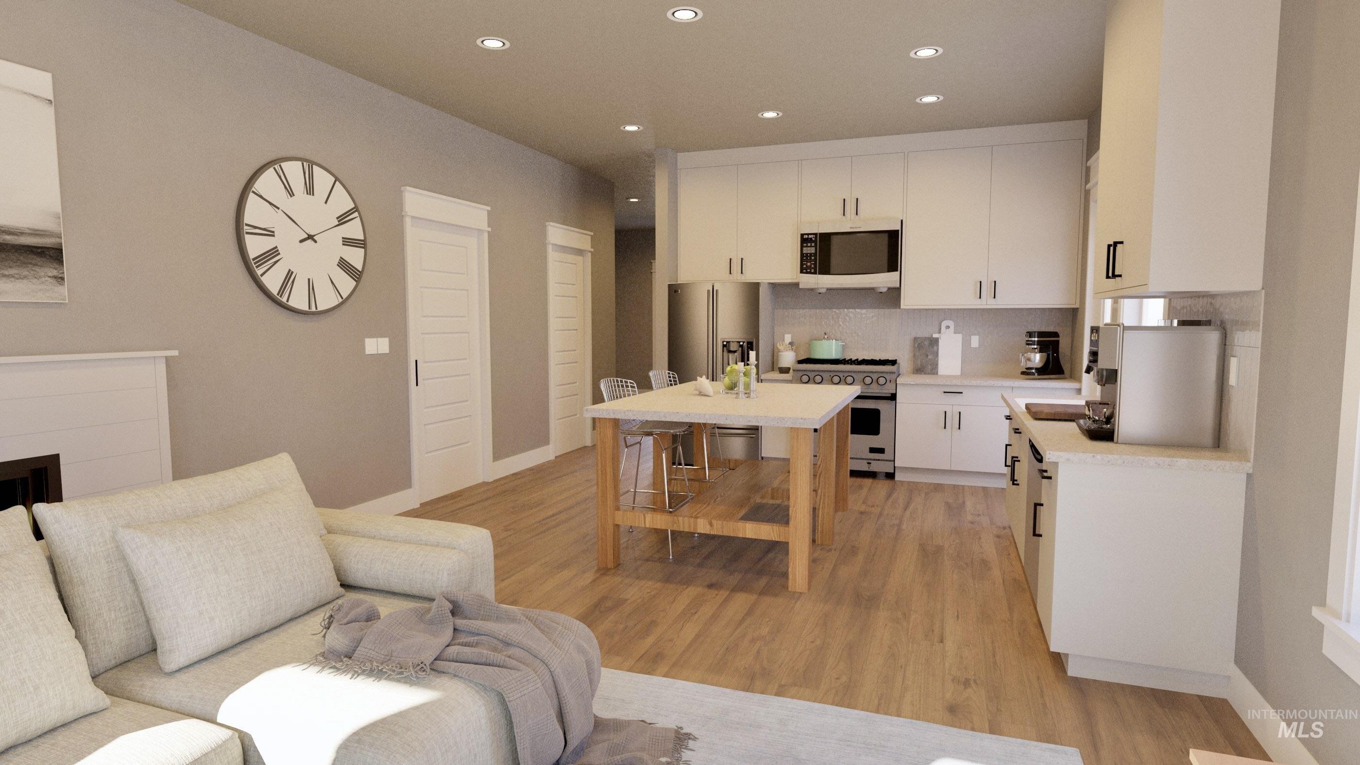Kitchen featuring white cabinetry, stainless steel appliances, recessed lighting, decorative backsplash, and light wood finished floors