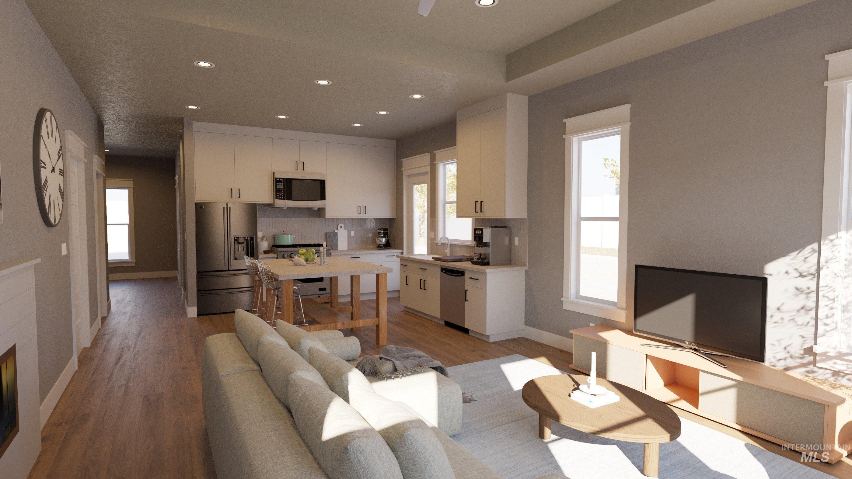 Living area featuring light wood finished floors and recessed lighting