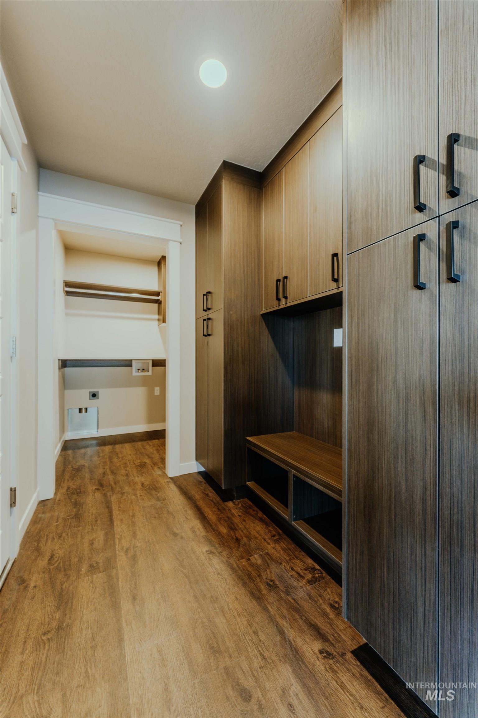 Mudroom with dark wood-style floors and recessed lighting