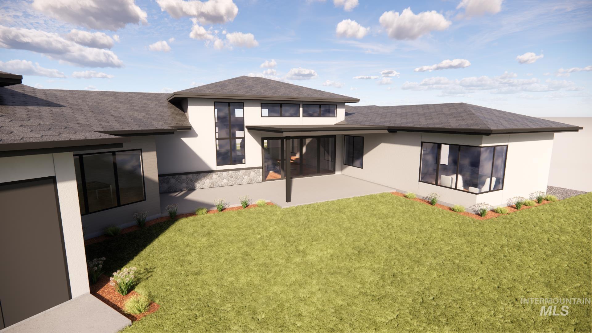 Rear view of house with stucco siding, a yard, and a shingled roof