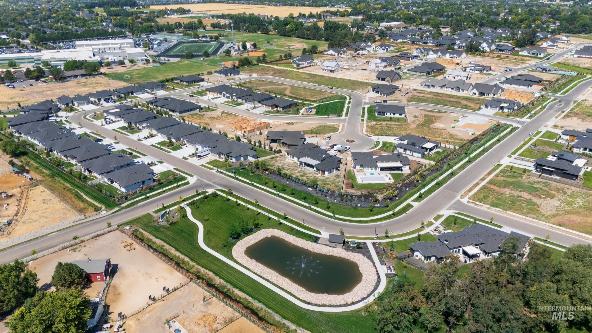 Aerial overview of property's location with nearby suburban area