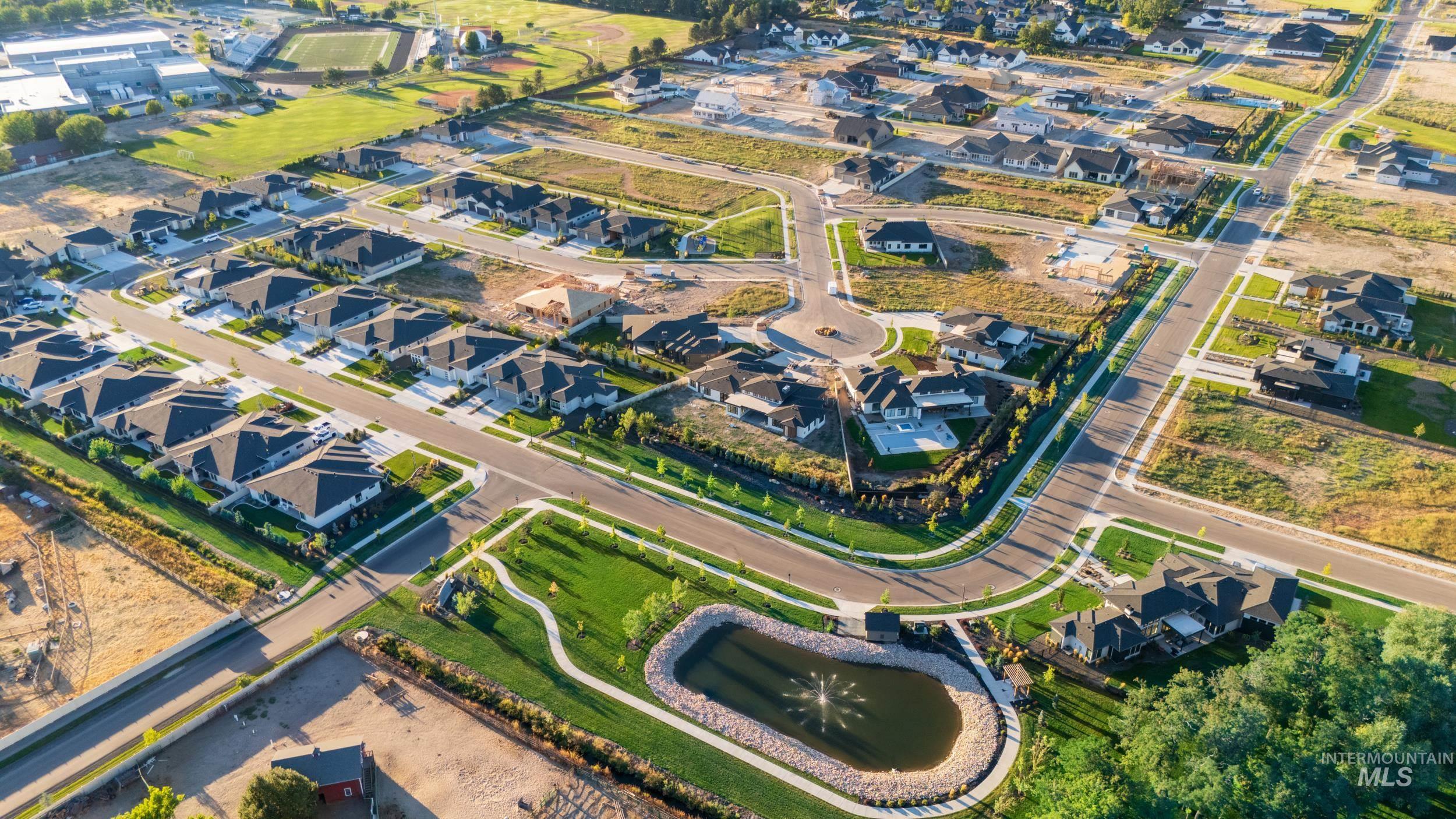 Aerial overview of property's location with nearby suburban area