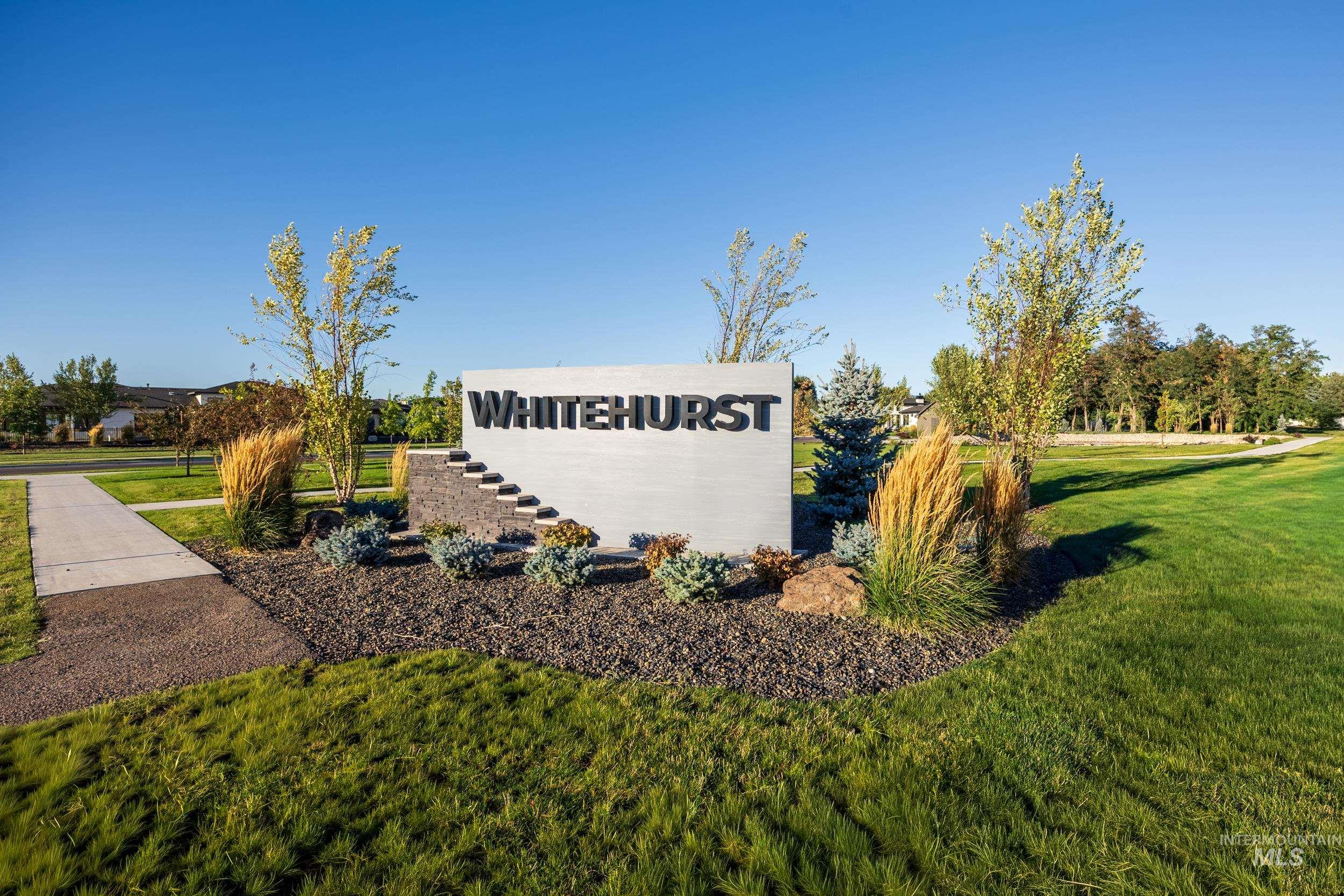 Community sign with a yard