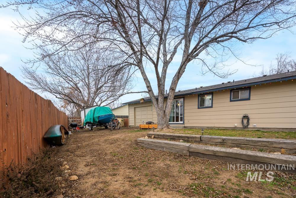 Rear view of house with a garage
