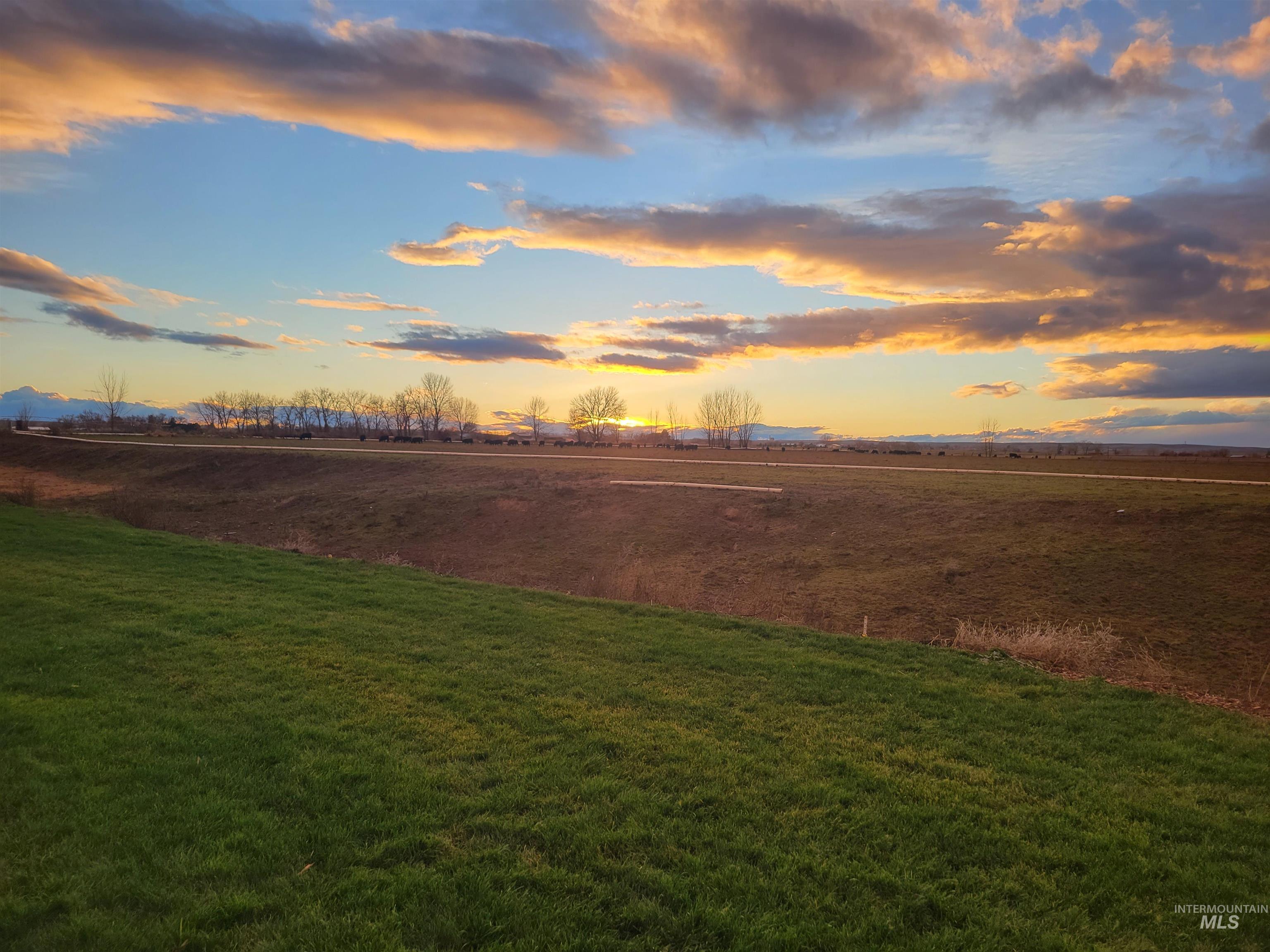 View of green lawn featuring a view of countryside
