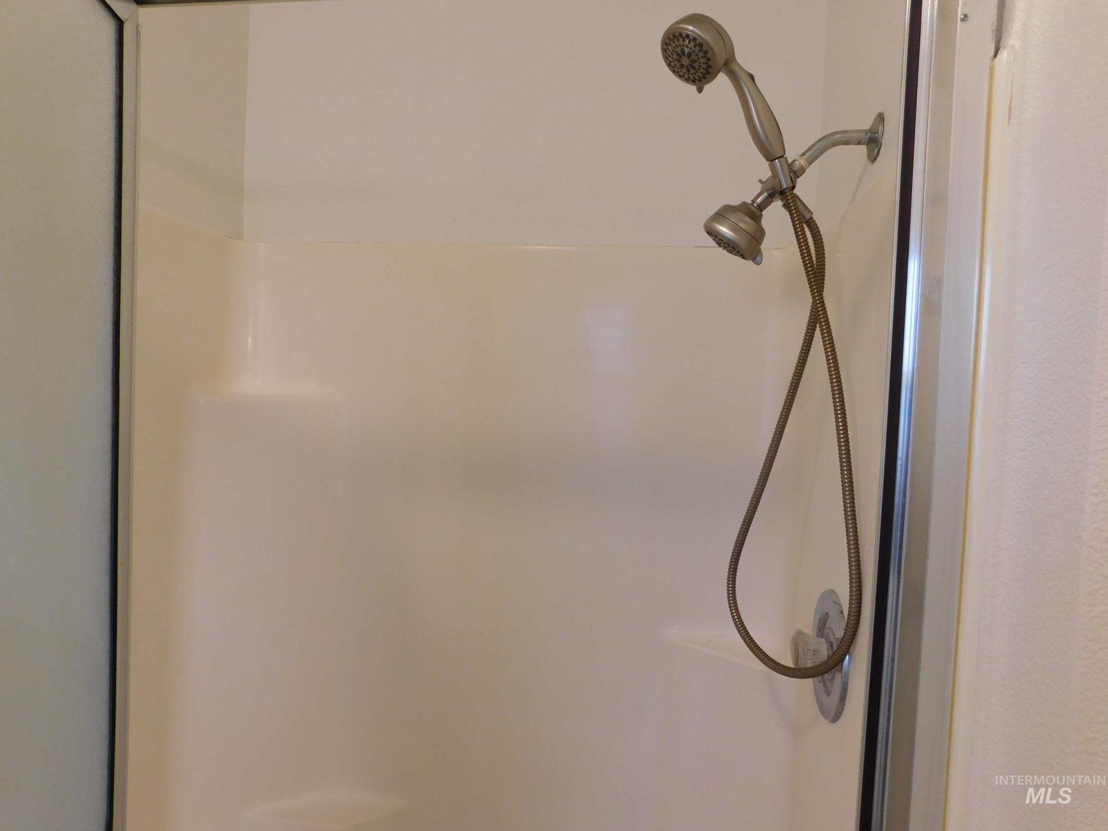 Bathroom view of a stall shower
