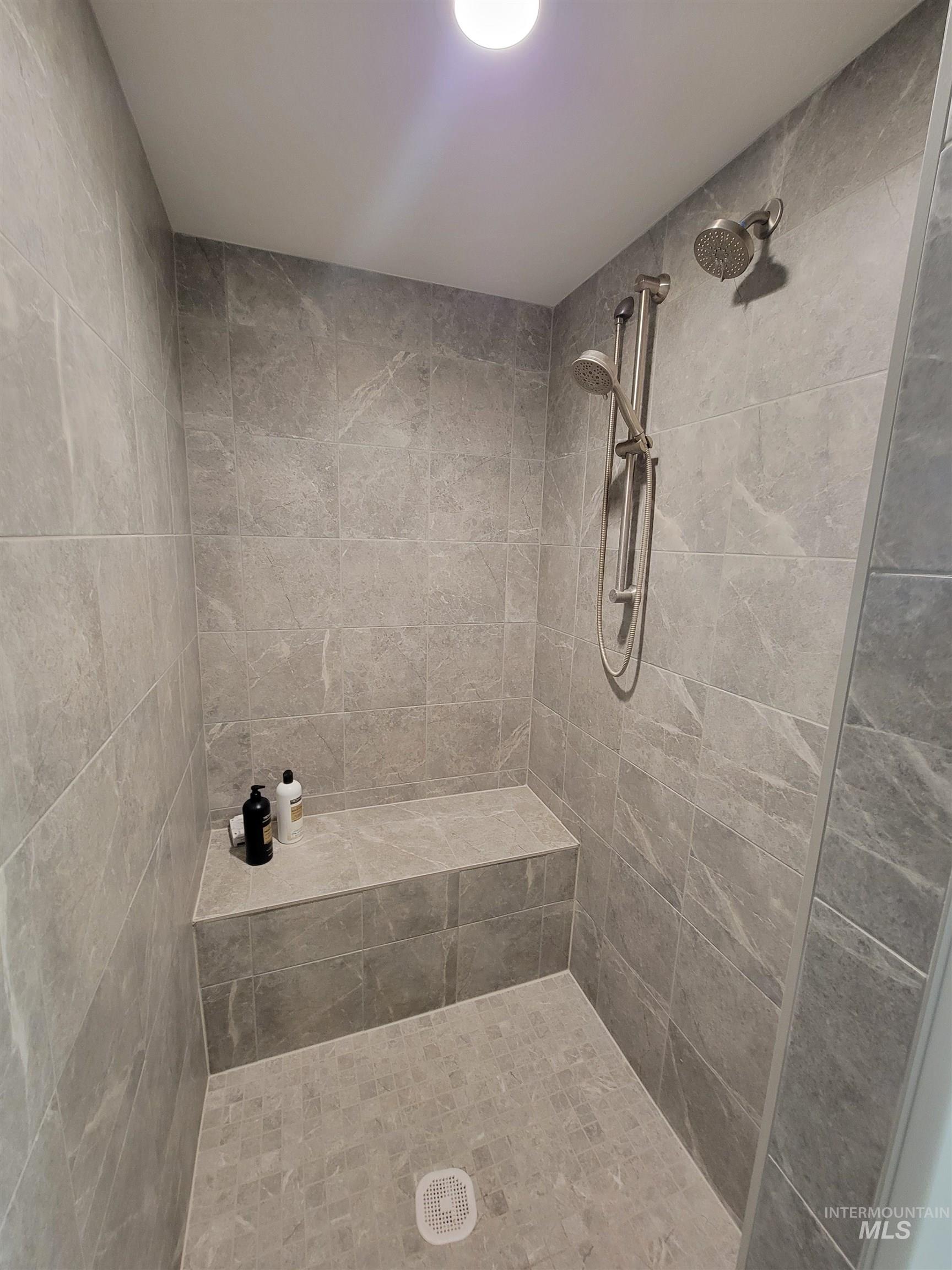 Bathroom with tiled shower