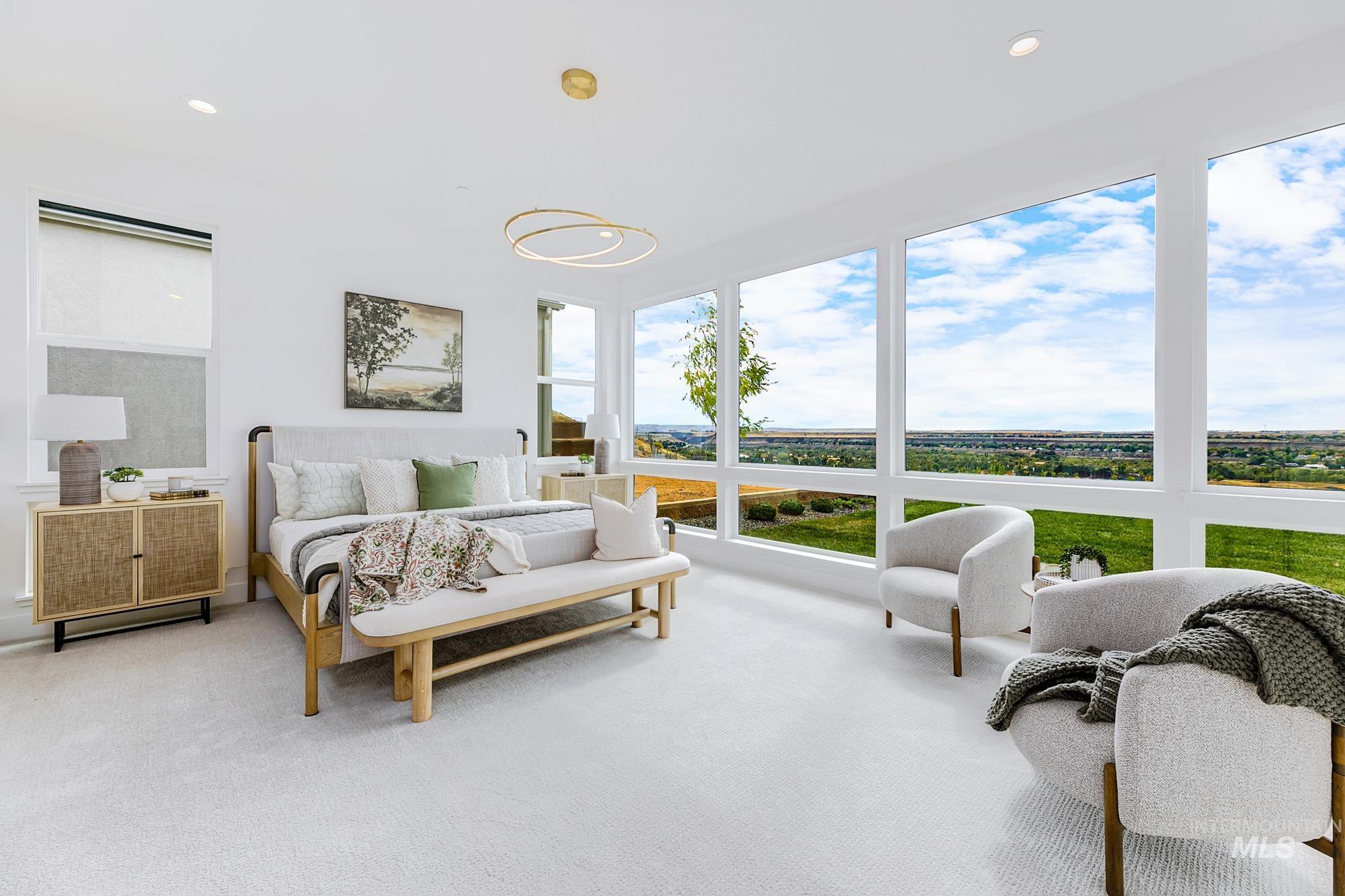 Carpeted bedroom with recessed lighting