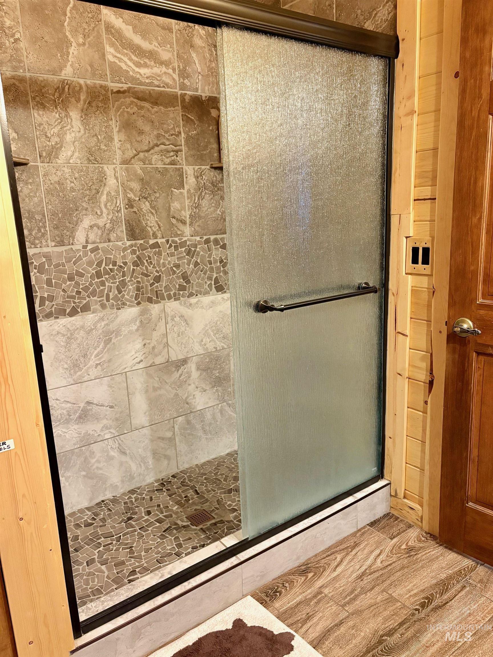 Bathroom with a shower stall