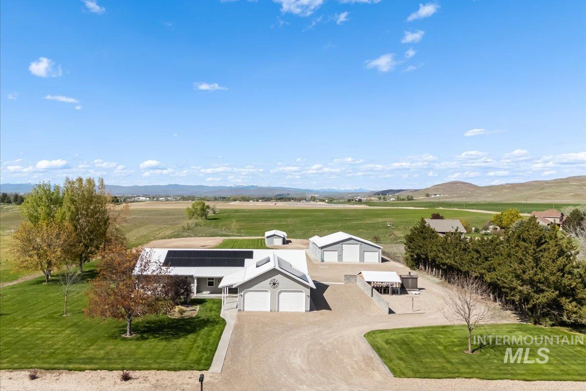 View of rural area with a mountain backdrop