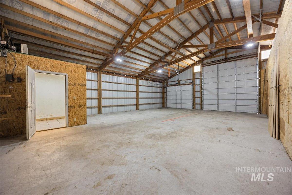 Garage featuring metal wall