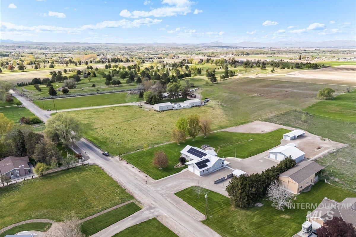 Overview of rural landscape with a mountain backdrop