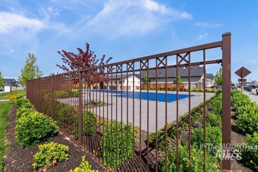 Community pool featuring a patio area