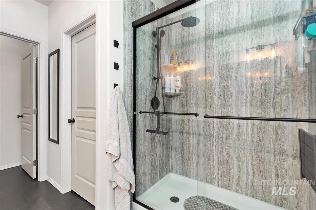 Bathroom featuring a shower stall