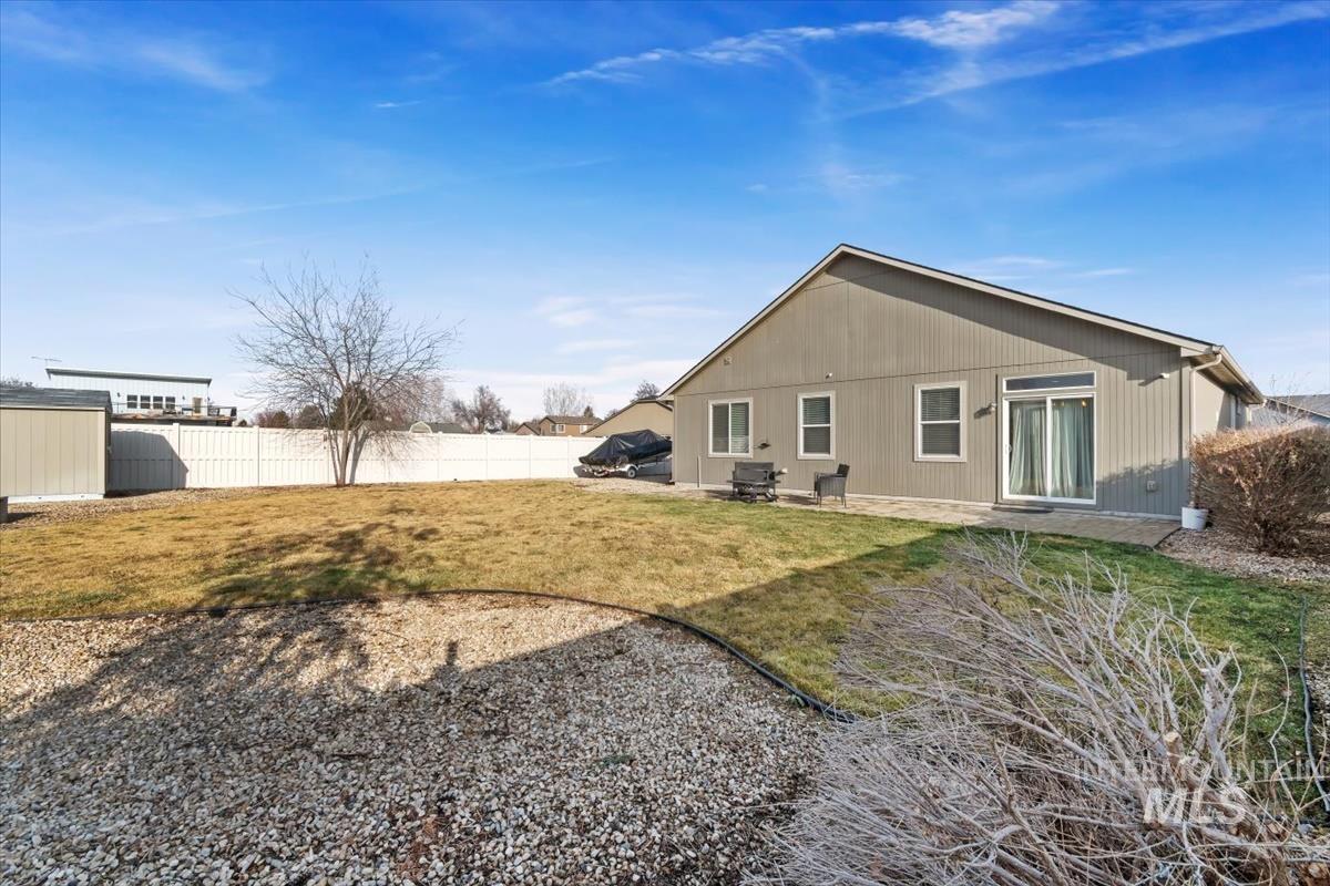 Rear view of house with a patio area