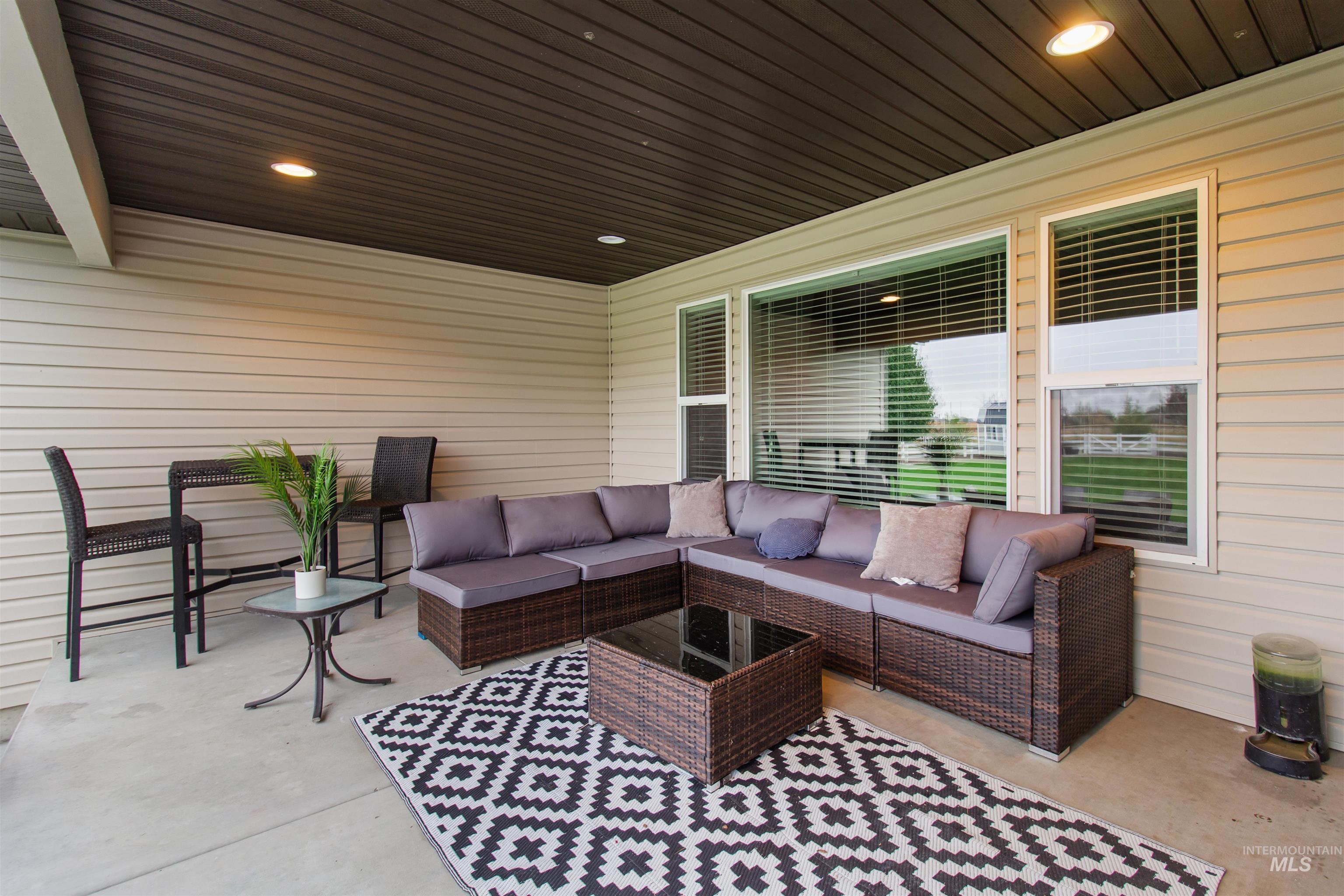 View of patio with an outdoor living space