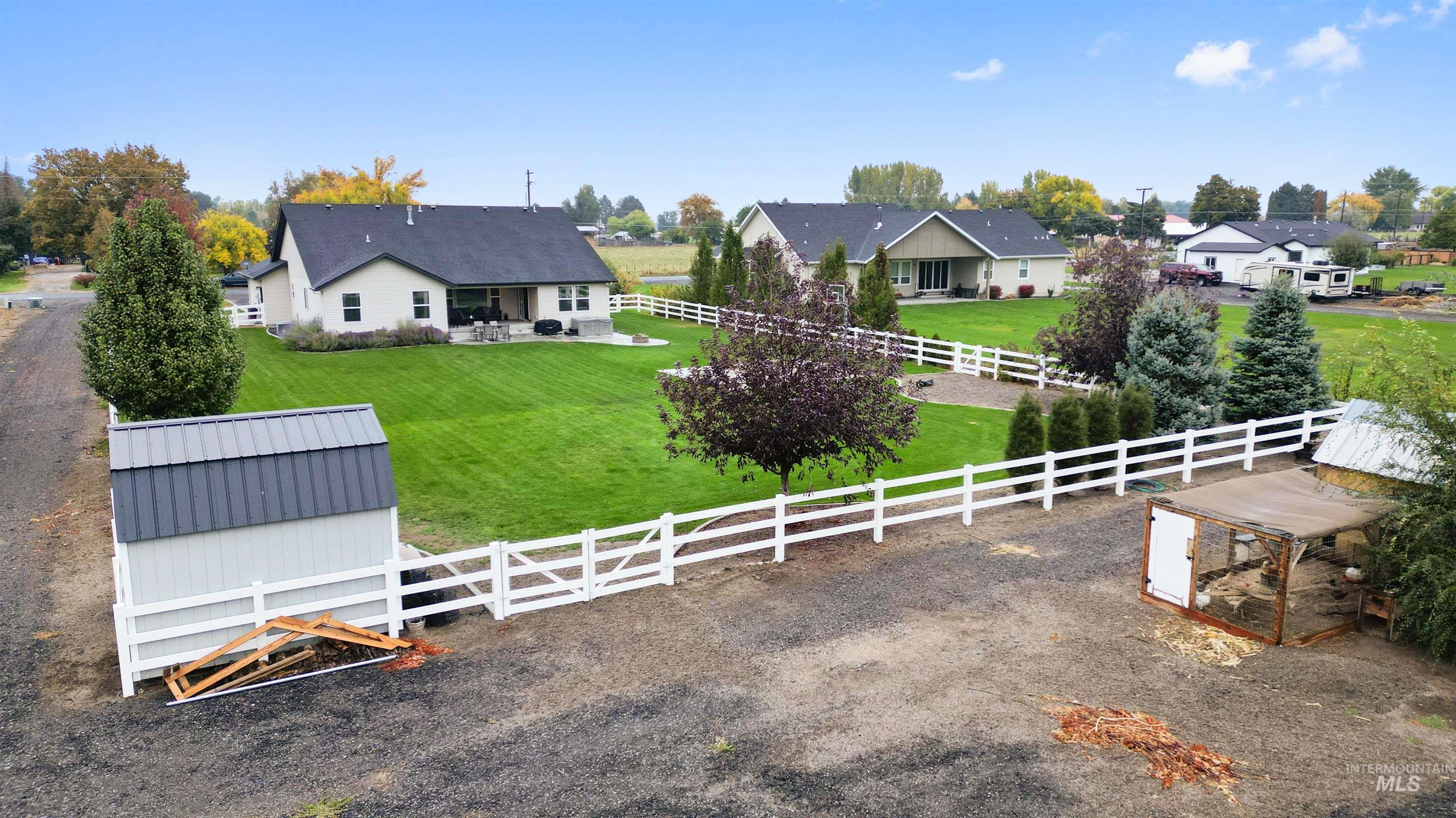 View of yard with a patio and an outdoor structure