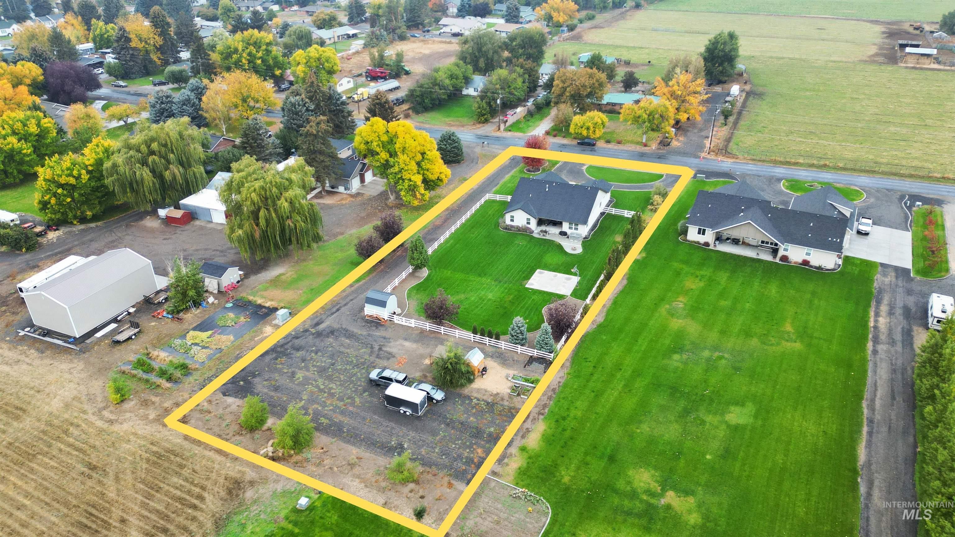 Aerial overview of property's location featuring property parcel outlined