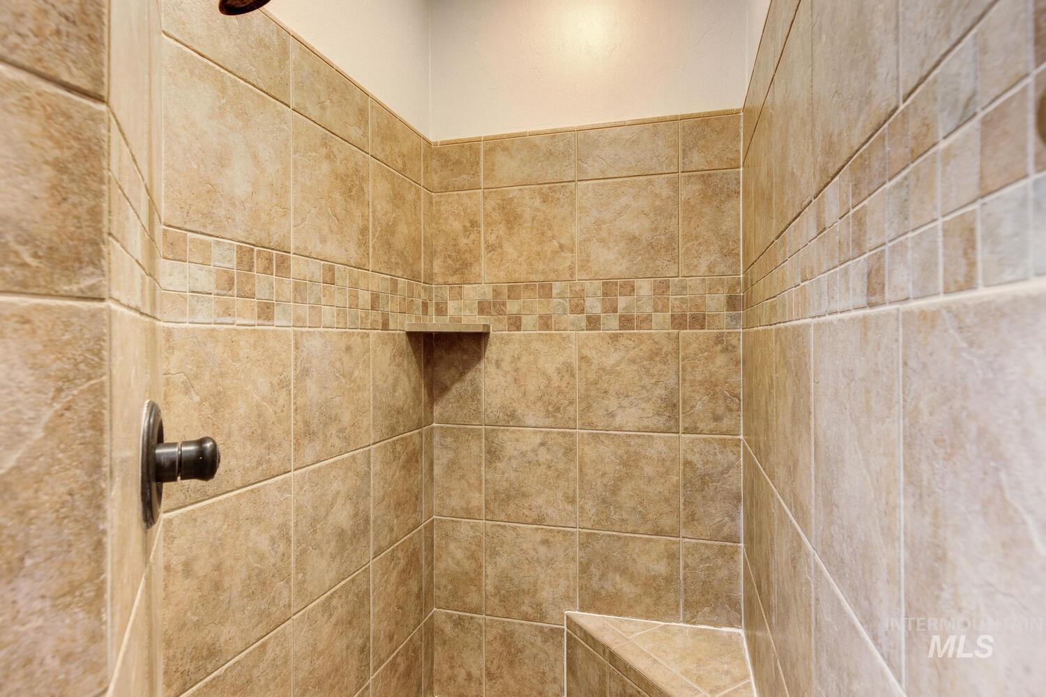 Bathroom view of tiled shower