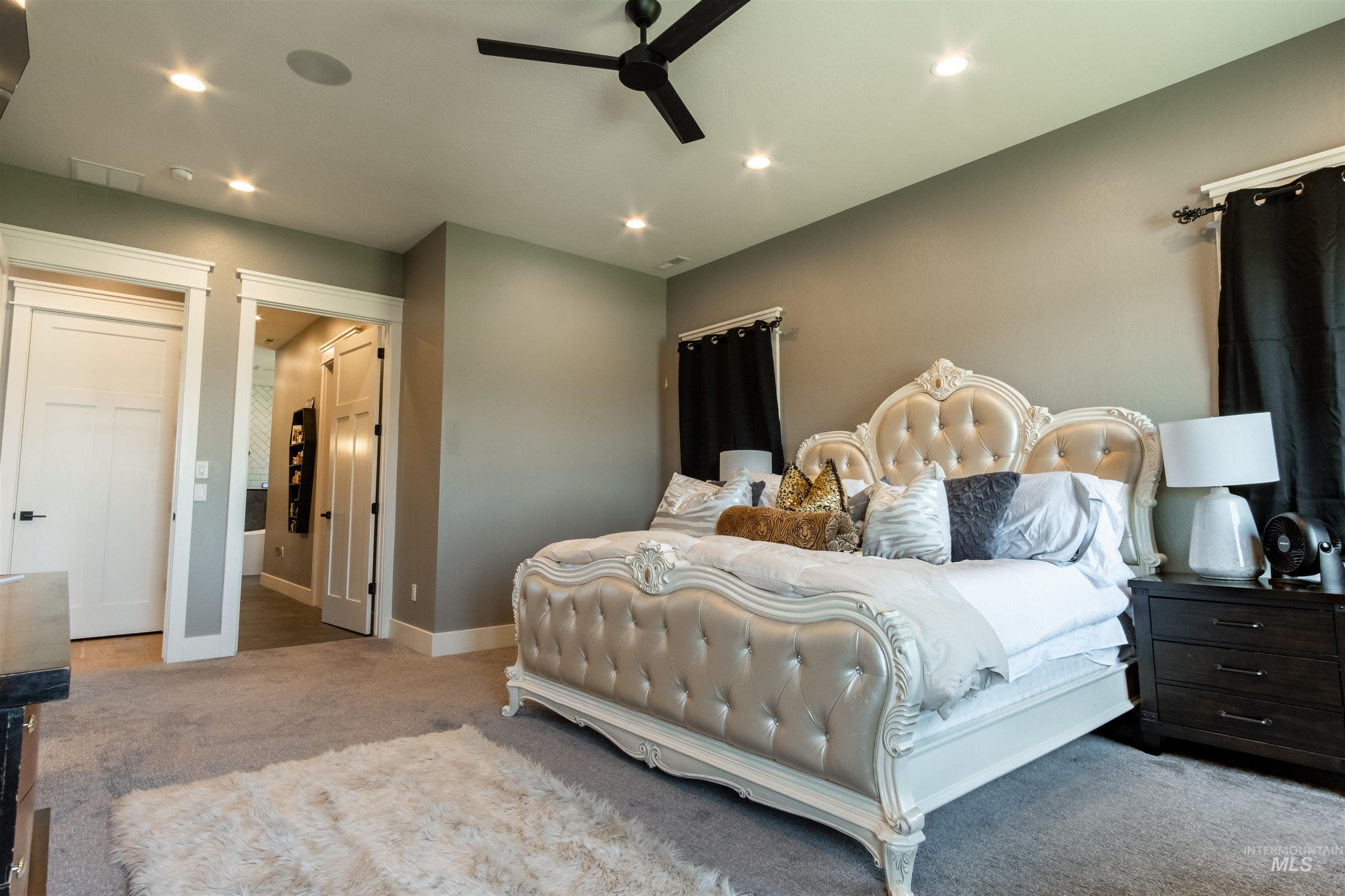 Bedroom with carpet, recessed lighting, and a ceiling fan