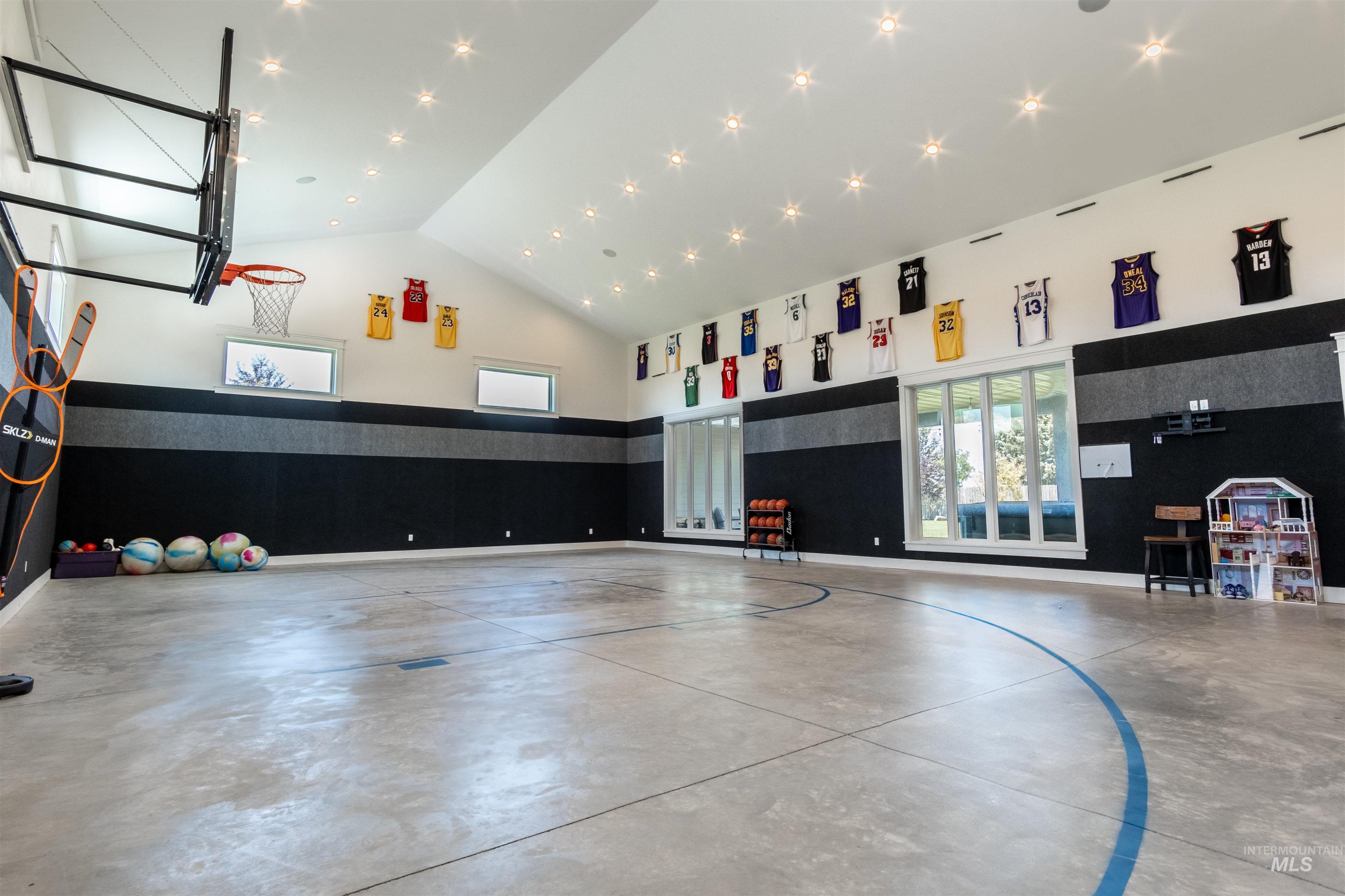 View of sport court with community basketball court and healthy amount of natural light