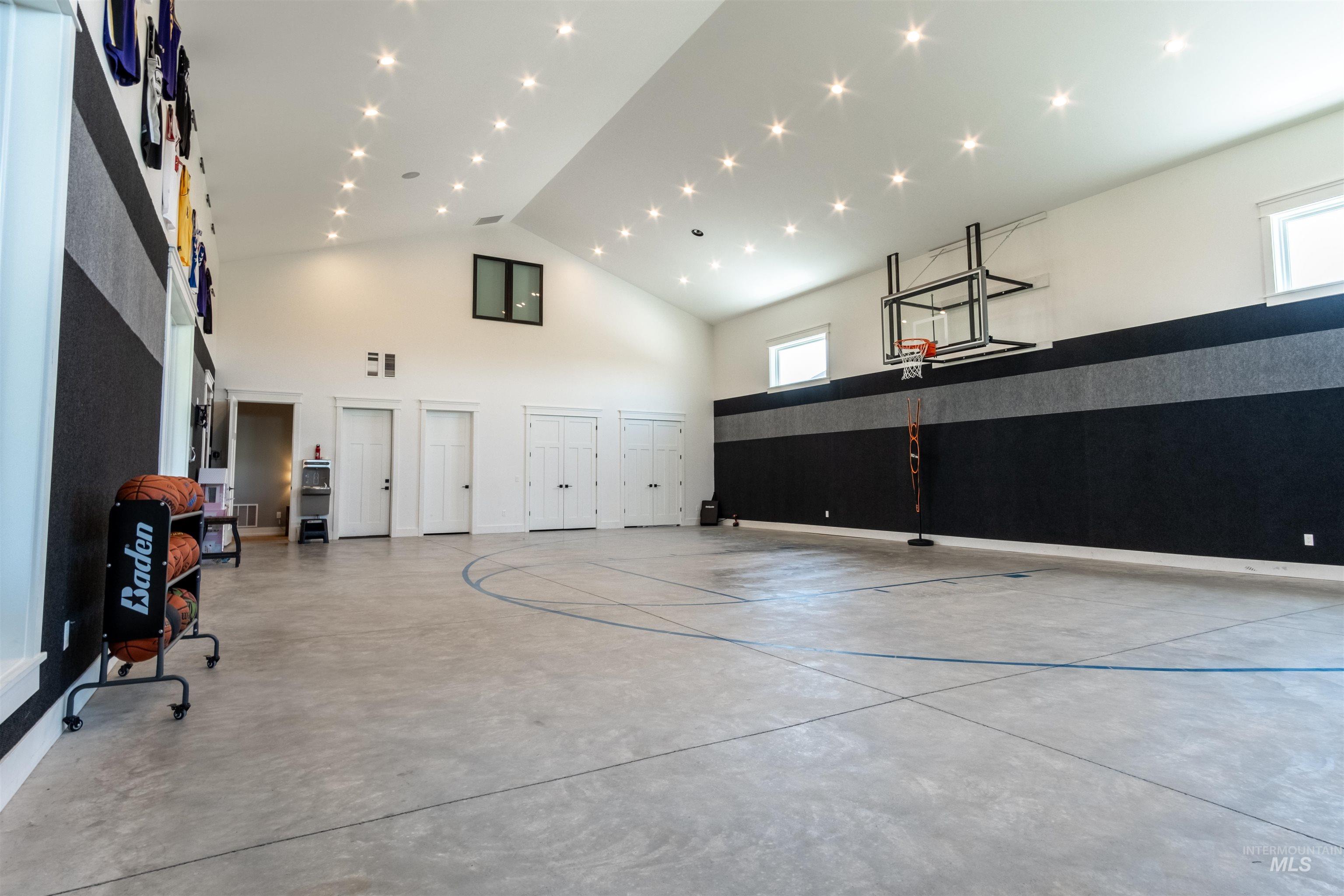 View of sport court featuring community basketball court and healthy amount of natural light