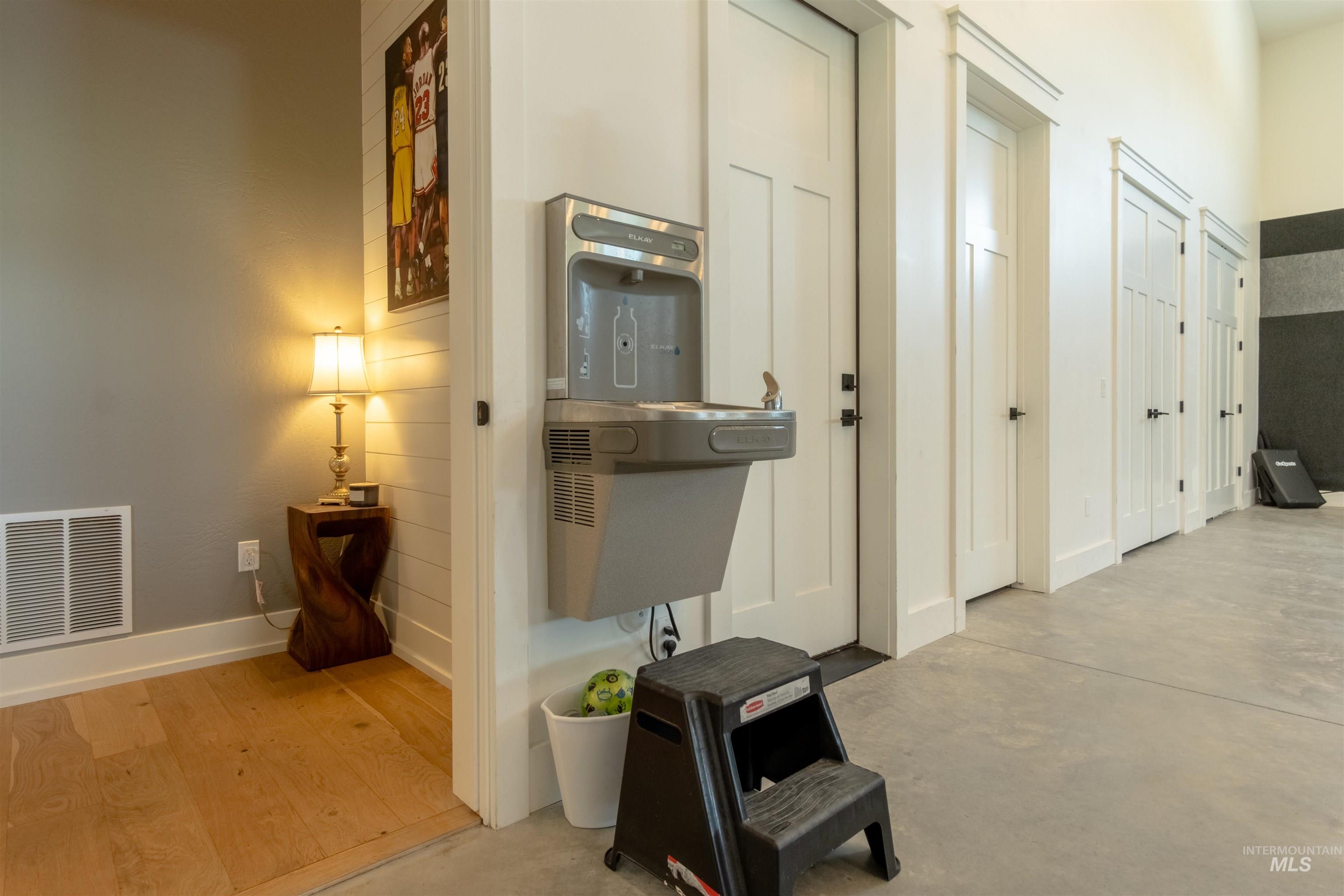 Hallway featuring baseboards