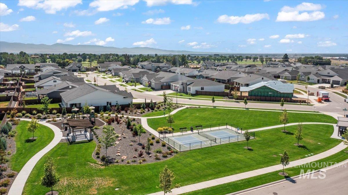 Aerial view of residential area with a mountain backdrop