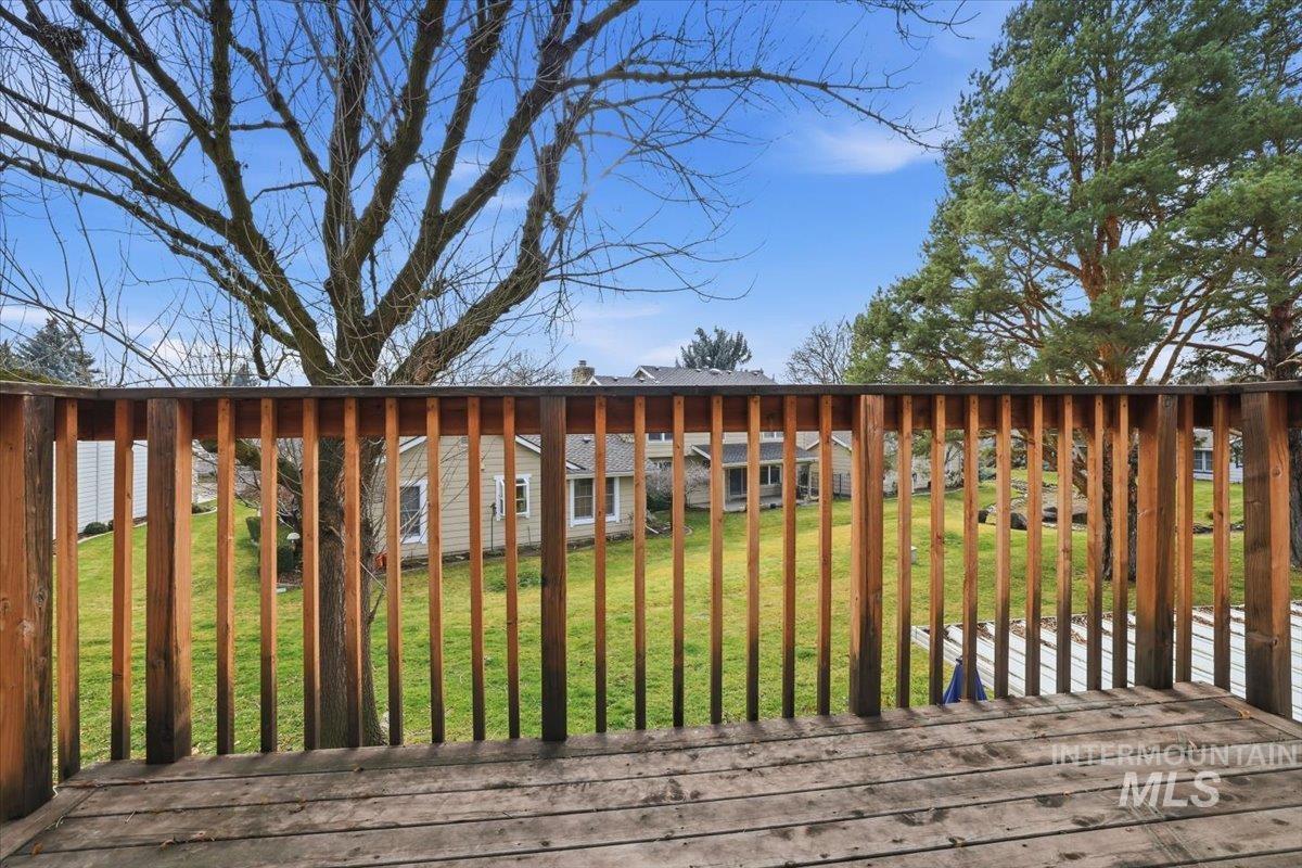 Wooden terrace with a yard