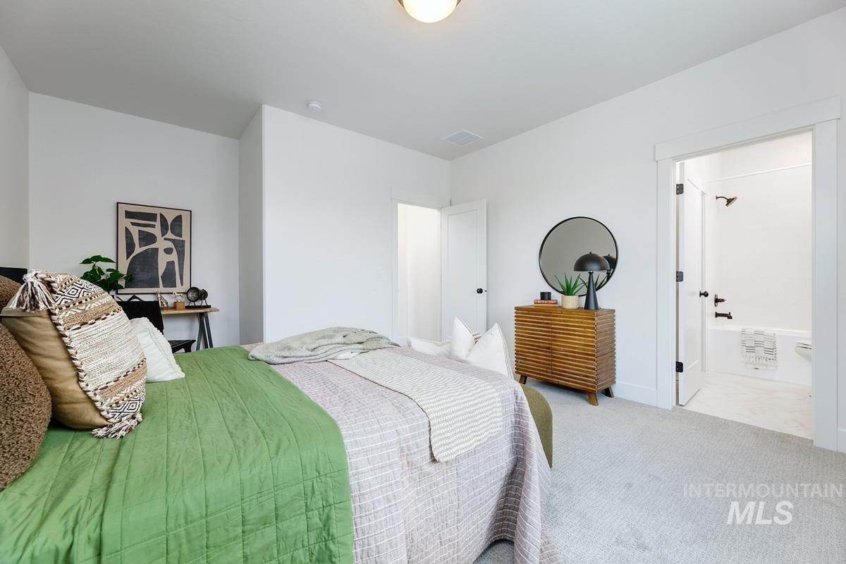 Bedroom featuring carpet flooring
