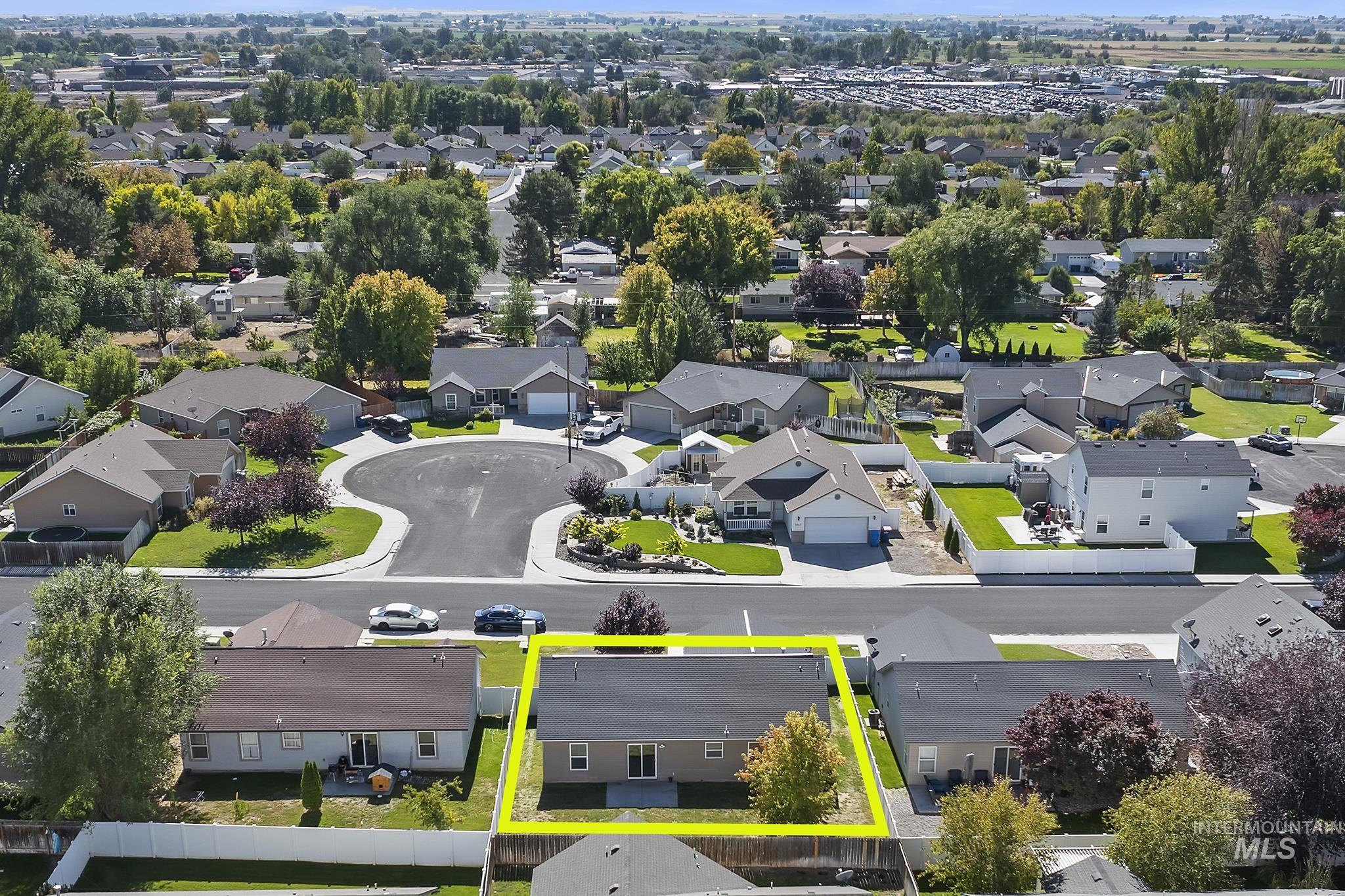 Aerial perspective of suburban area with property boundaries highlighted