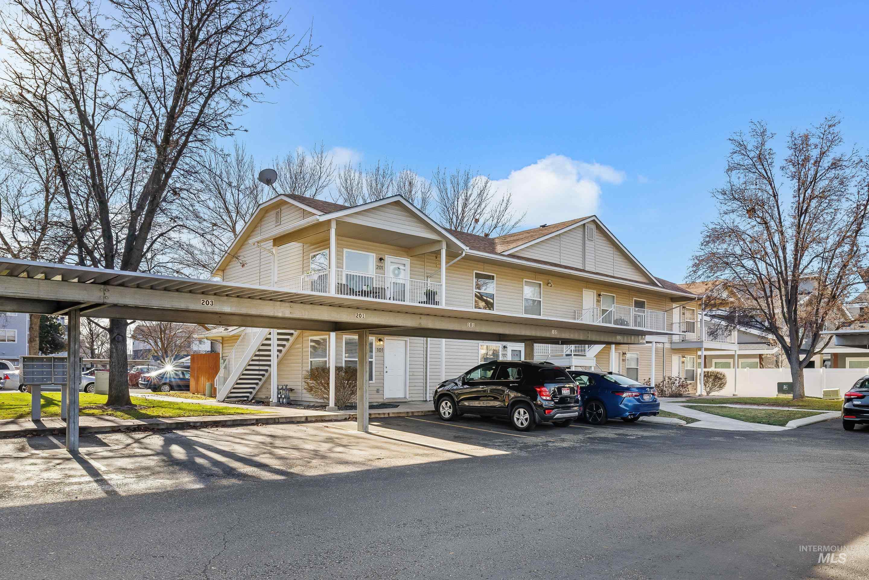 View of front of property featuring  covered parking