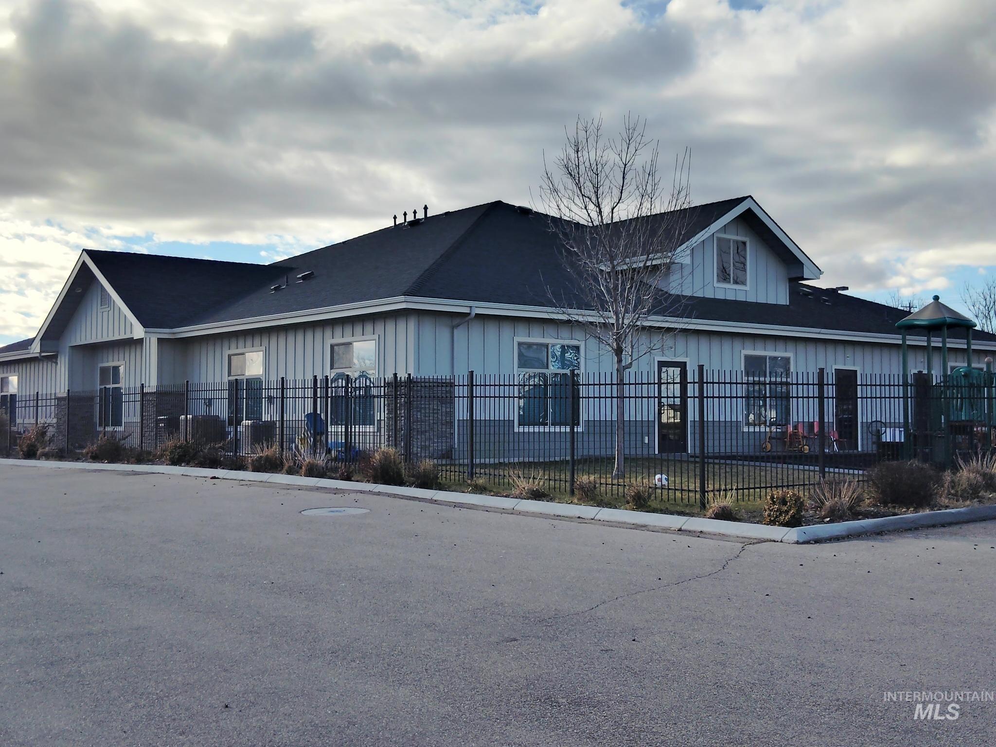 View of front of home with board and batten siding