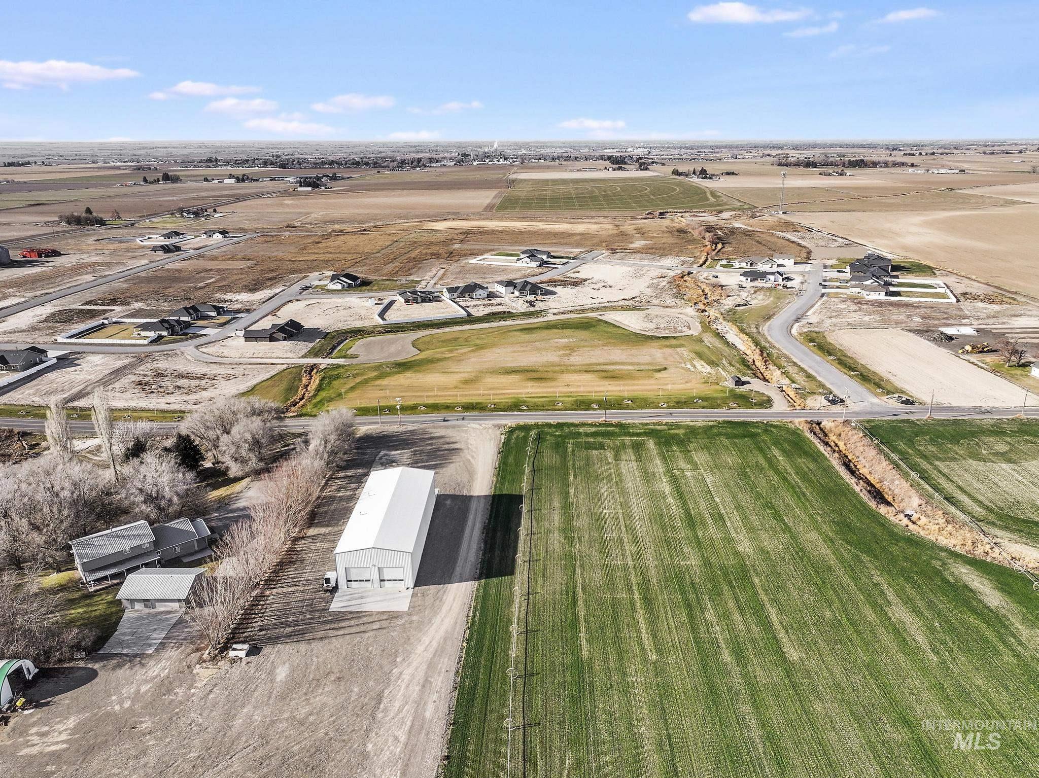 Aerial view of property's location featuring rural landscape