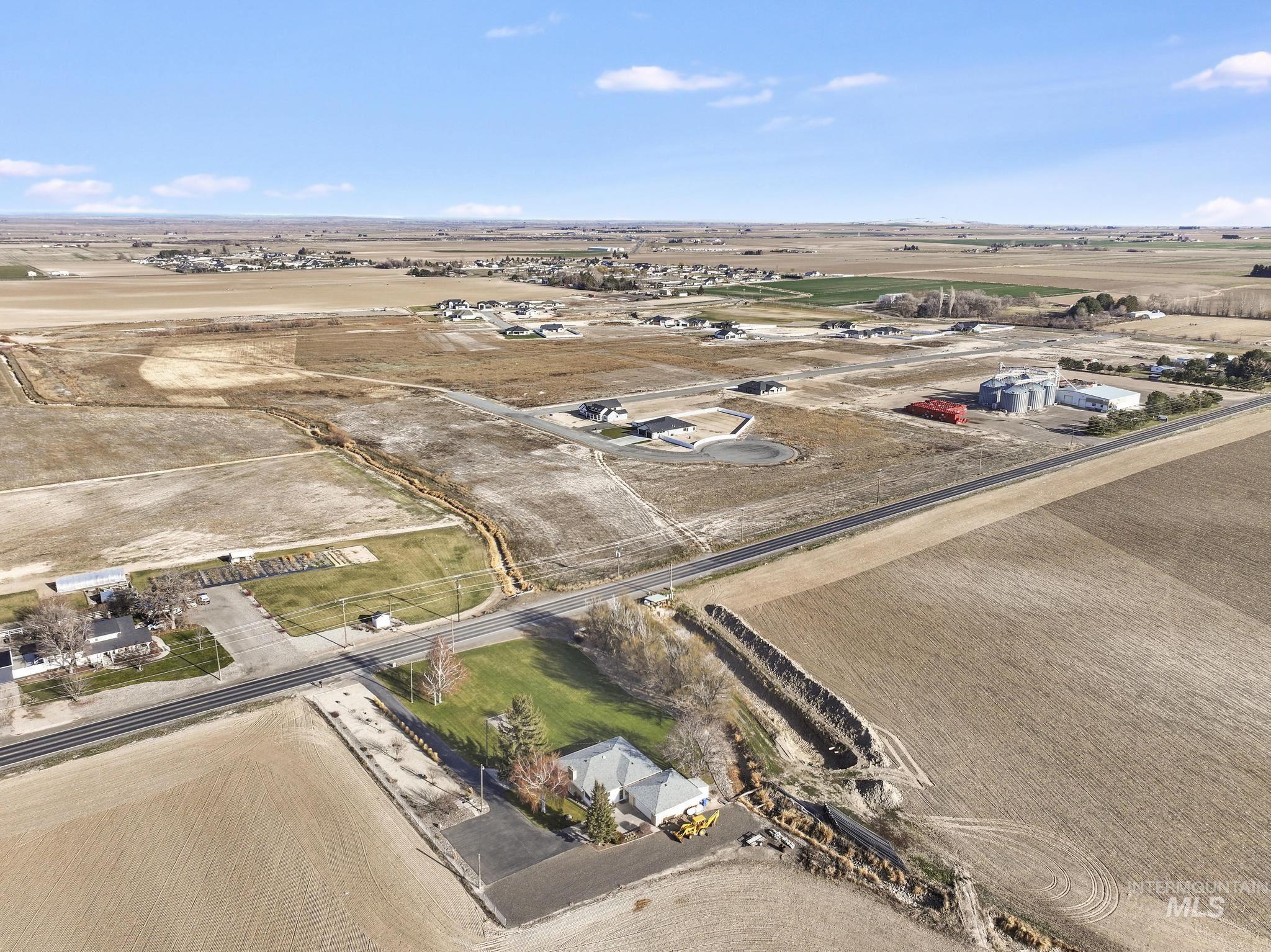 Aerial overview of property's location with rural landscape