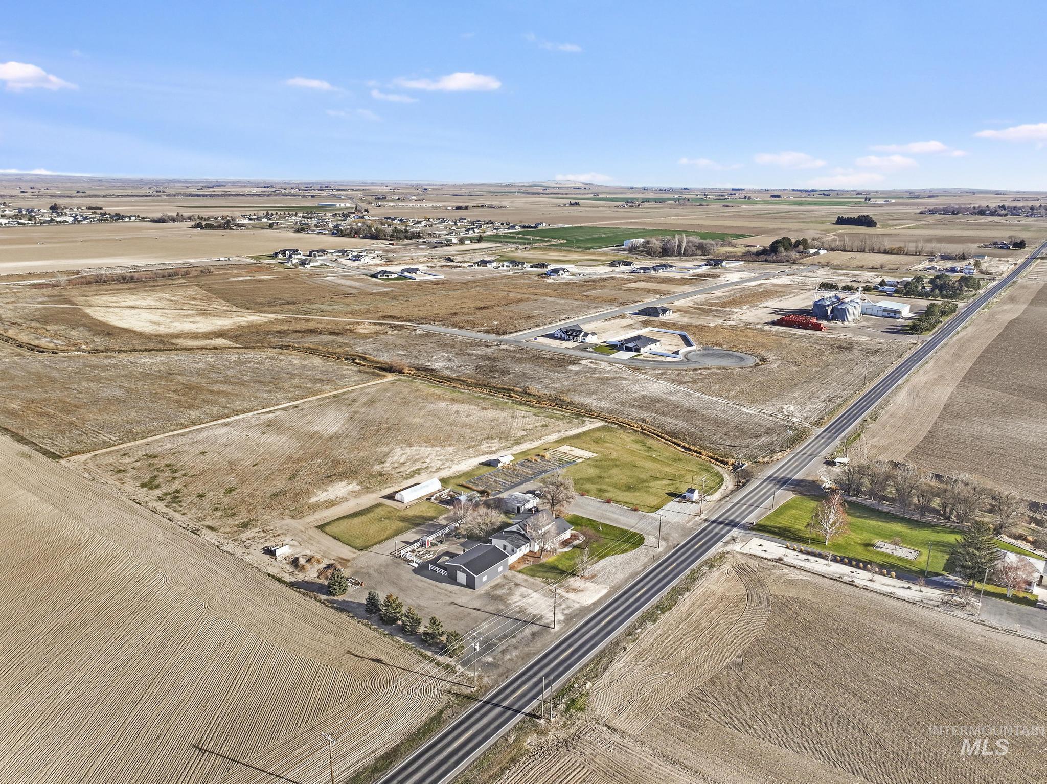 Aerial view of property's location with rural landscape