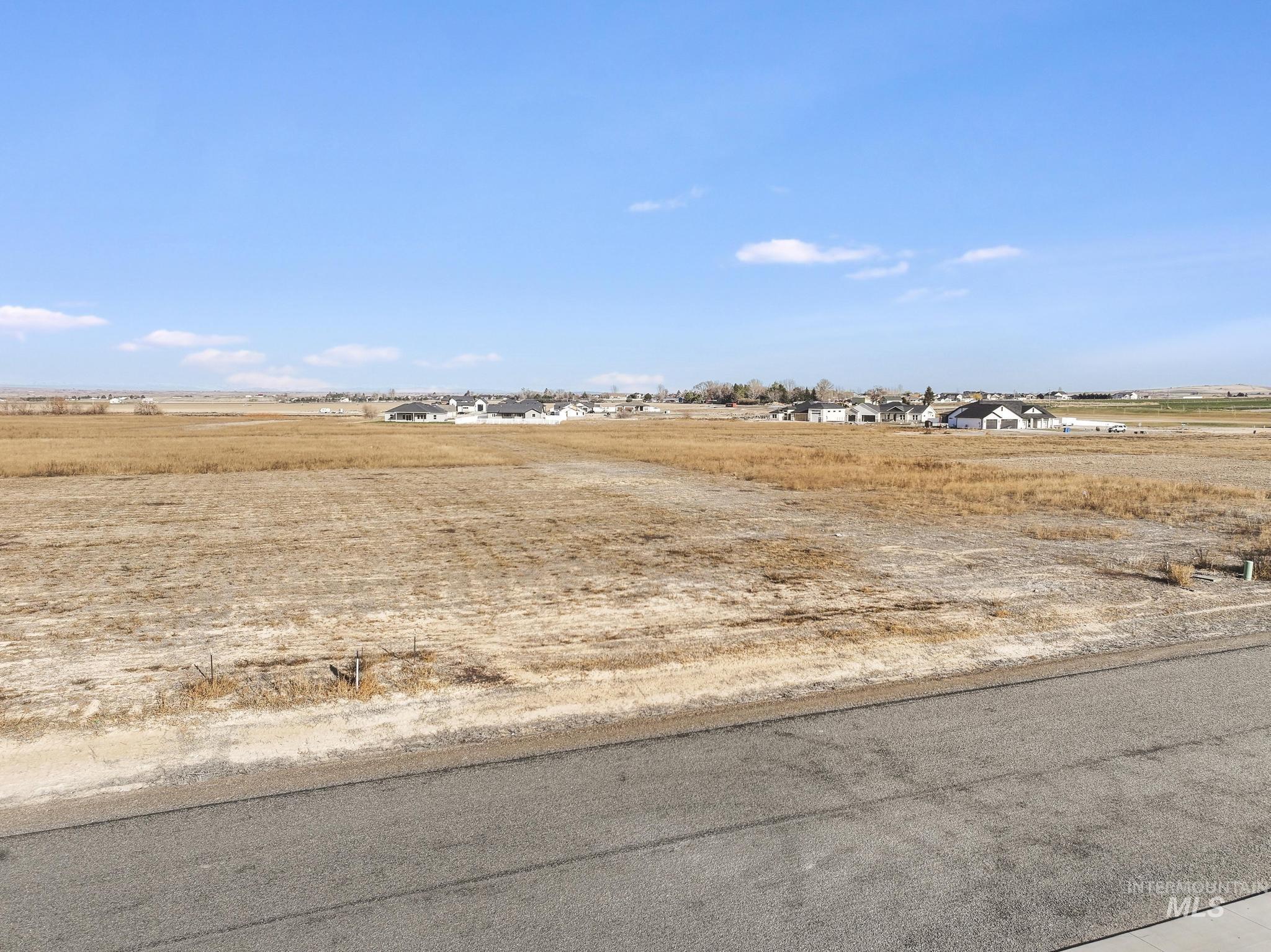 View of yard featuring a view of rural / pastoral area
