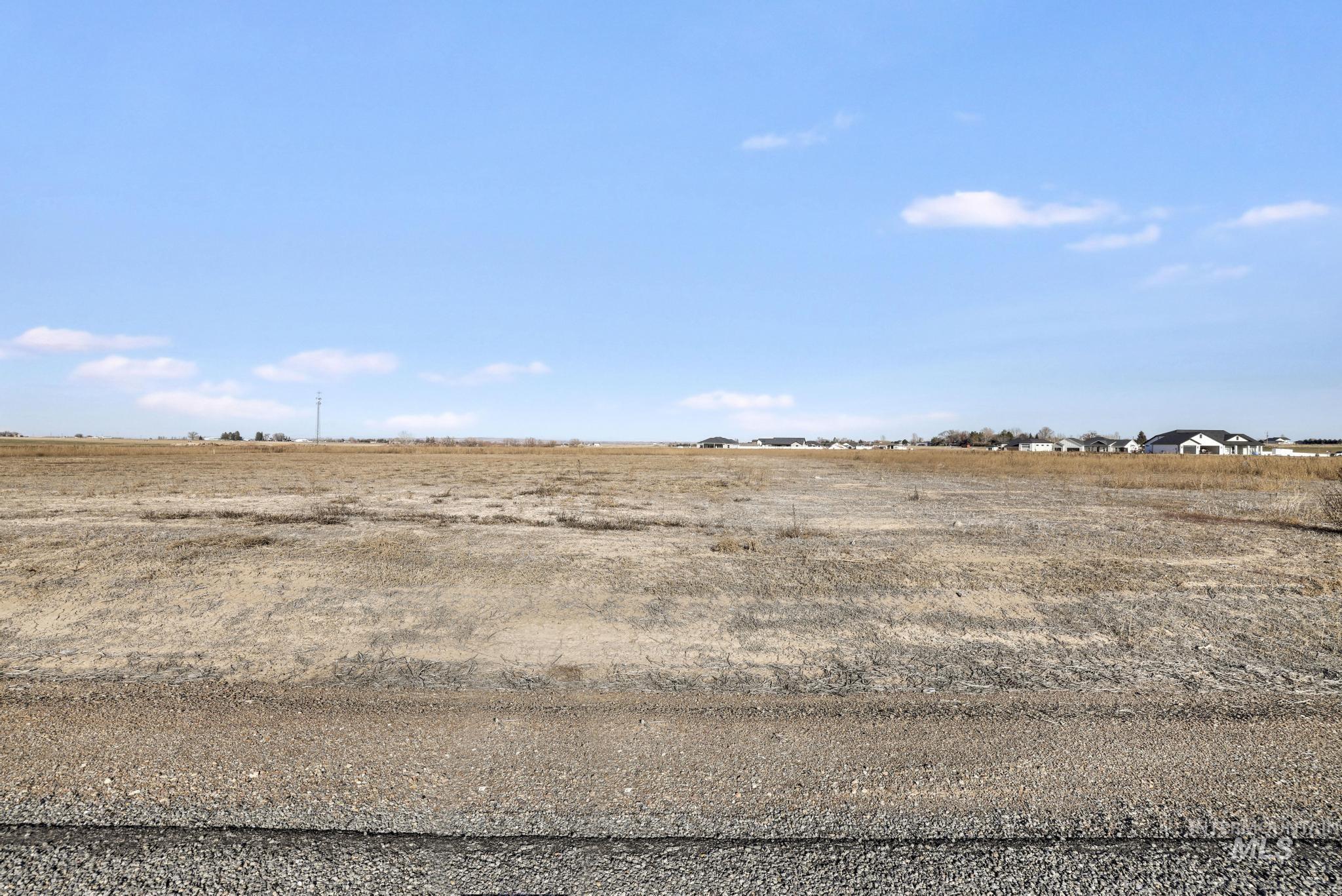 View of yard with a view of rural / pastoral area